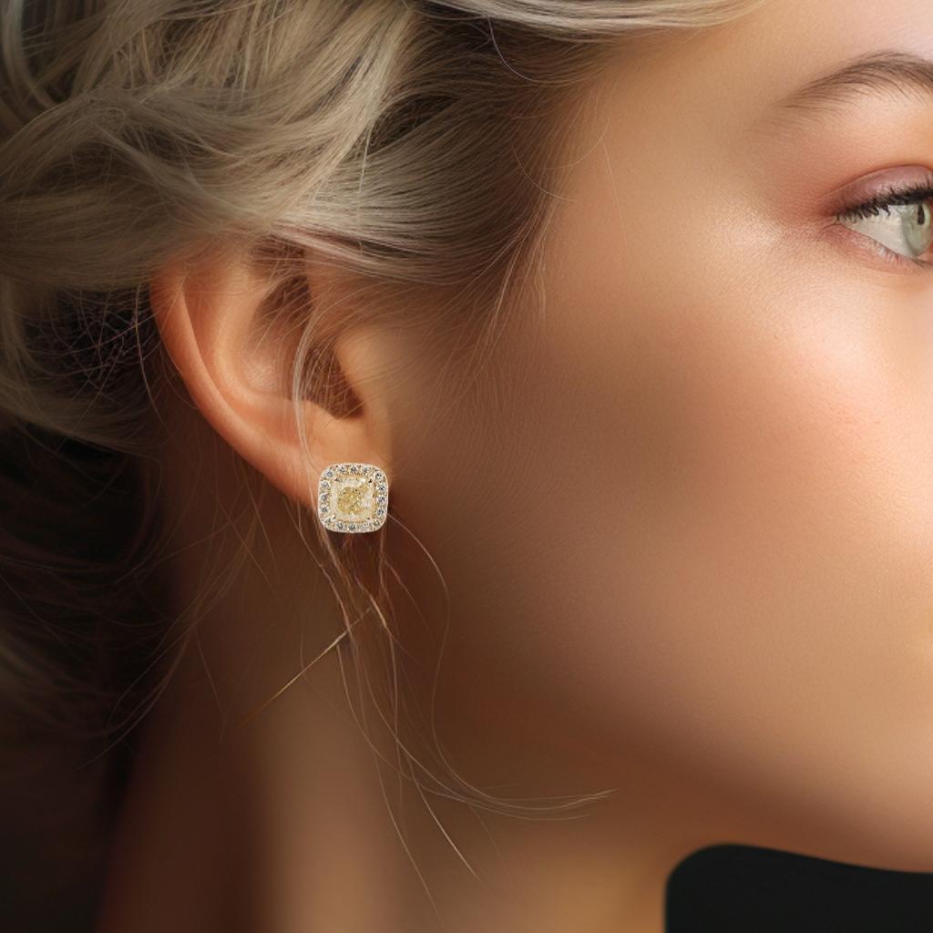 A beautiful Earrings with dazzling 3-carat Square Cushion natural diamonds. It has 0.5 carats of side diamonds which add more to its elegance. The jewelry is made of 18K Yellow Gold with a high-quality polish. It comes with an IGI certificate and a