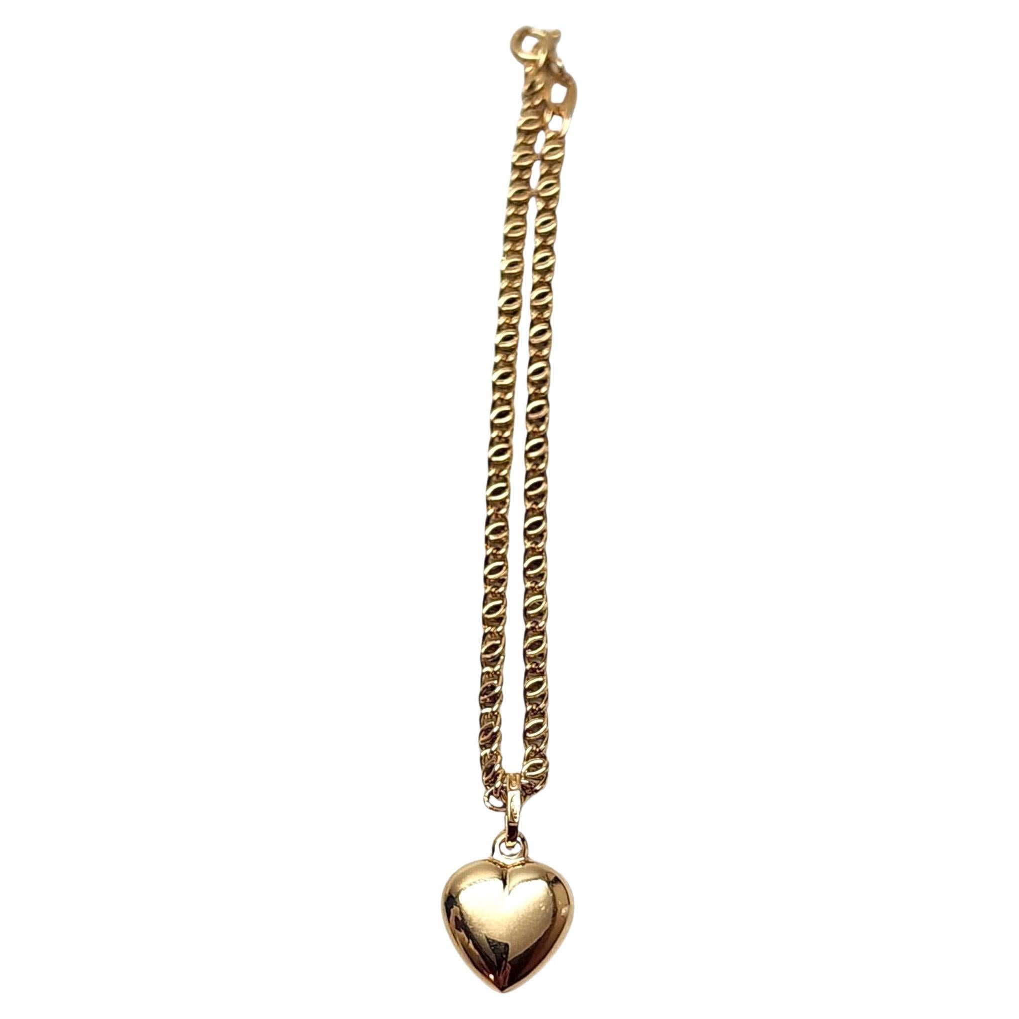 18K Yellow Gold Heart Bracelet

Wrap your wrist in love with this heart bracelet! This piece features a lovely bracelet with a heart charm in 18 karat yellow gold.

Hallmark: 348AR 750

Weight: 2.9 g / 1.9 dwt.

Chain Length: 6.5