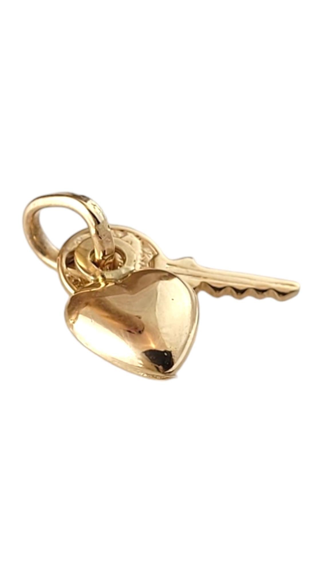 18K yellow Gold Heart & Key Charm #16880

This adorable 18K gold charm features a beautiful dangling heart and key!

Size: 18.6mm X 7.9mm X 3.7mm

Weight: 0.8 dwt/ 1.2 g

Hallmark: 750

Very good condition, professionally polished.

Will come