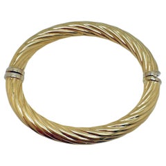 Bracciale a bracciale cavo in oro giallo 18K