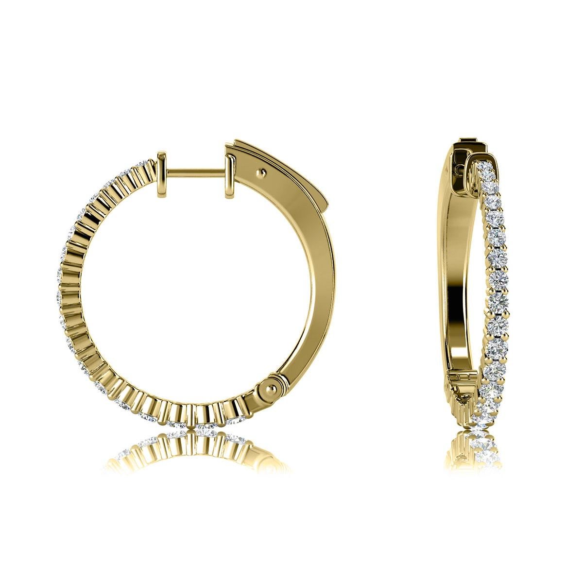 This hoop earring features one row of round brilliant diamonds micro-prong set. It is 1 of an inch in diameter. Experience the difference!

Product details: 

Center Gemstone Color: WHITE
Side Gemstone Type: NATURAL DIAMOND
Side Gemstone Shape: