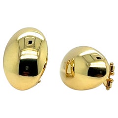 Orecchini a cerchio in oro giallo 18 carati con charms pendenti