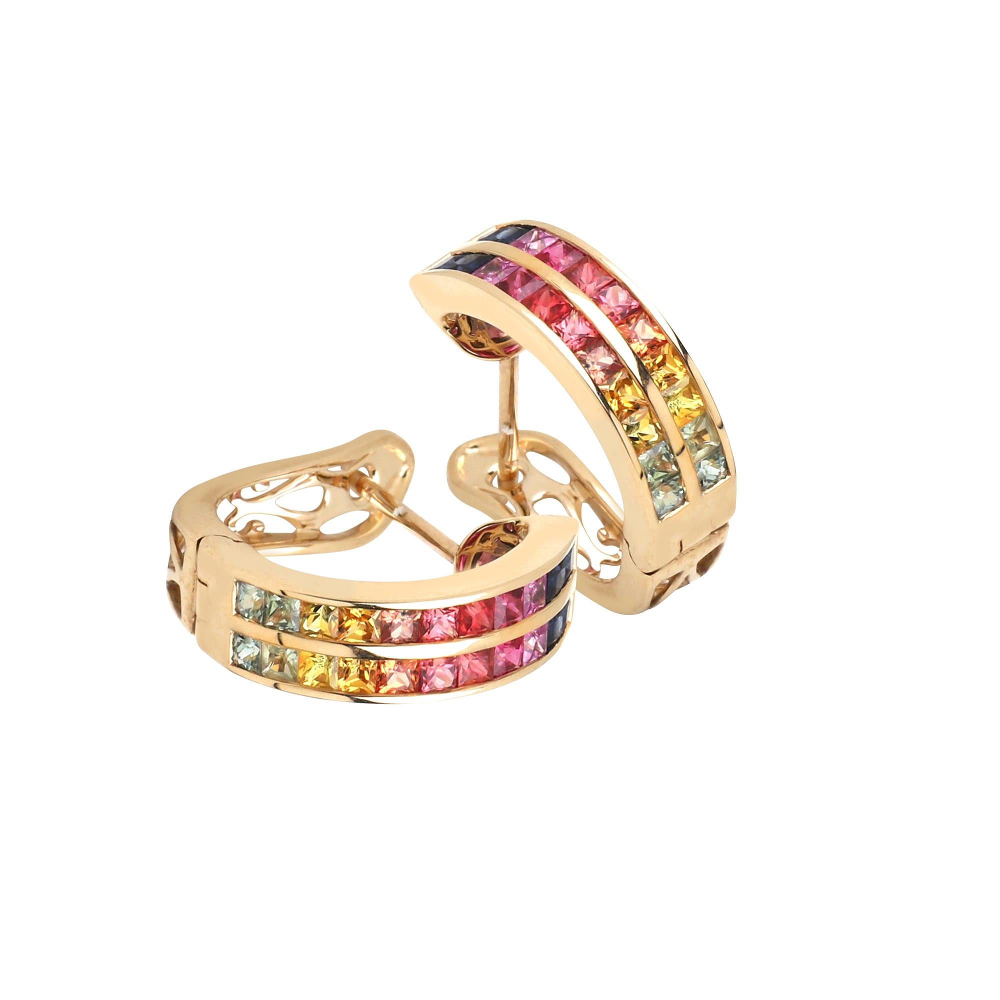 14 k yellow gold Huggies earring adorned with multicolored sapphire stones these huggies are perfect for any formal occasion or to add a touch of luxury to an everyday outfit. This stunning pair of earrings have perfectly matching all natural