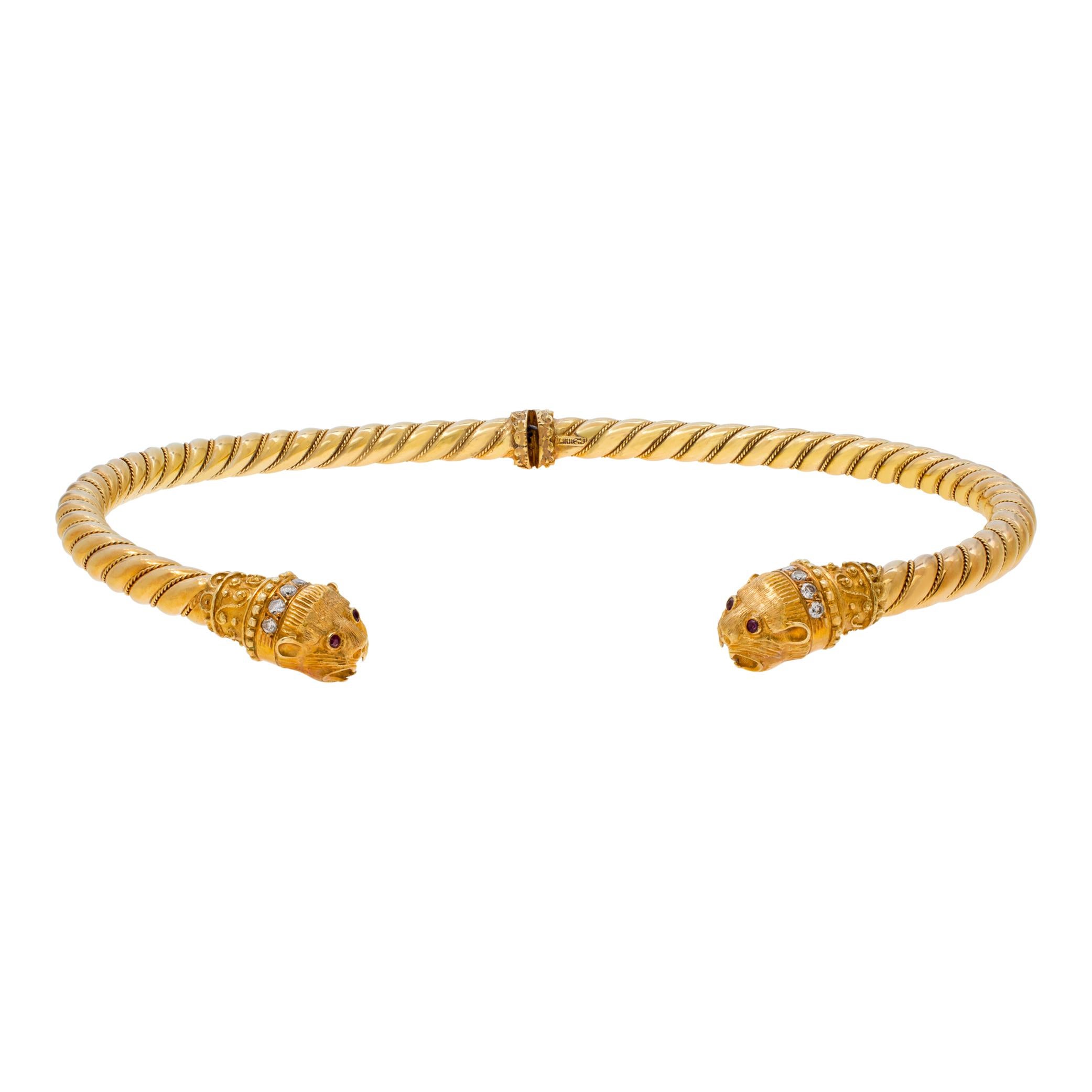 Vintage Greek designer Ilias Lalaouinis for Zolotas, original double Chimera heads design Torque necklace in 18K yellow gold. Chimera heads have approx 1.00 carat round brilliant cut diamonds collar and pair of brilliant cut rubies eyes each. Torque