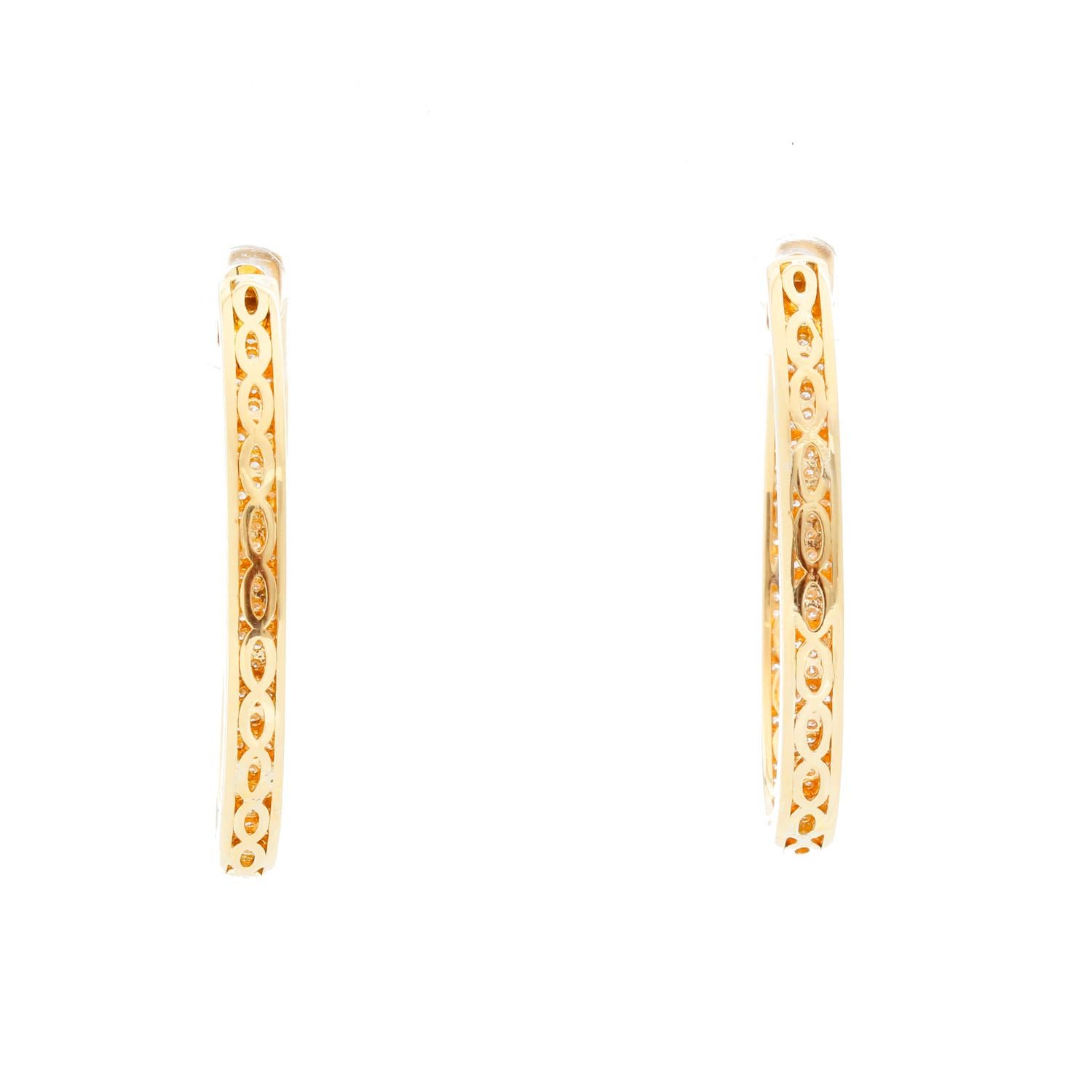 18K Yellow Gold Inside Out Pave Diamond Hoops - 2.80 cts  of Pave diamonds on 18K Yellow Gold. They are the perfect earrings, they are light and do not bring your ear down. Perfect for every day. Measurements: 1.5 long inch by 1 width  inch. Clairty