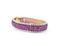 18 Karat Yellow Gold Invisible Set Diamond and Ruby Bracelet