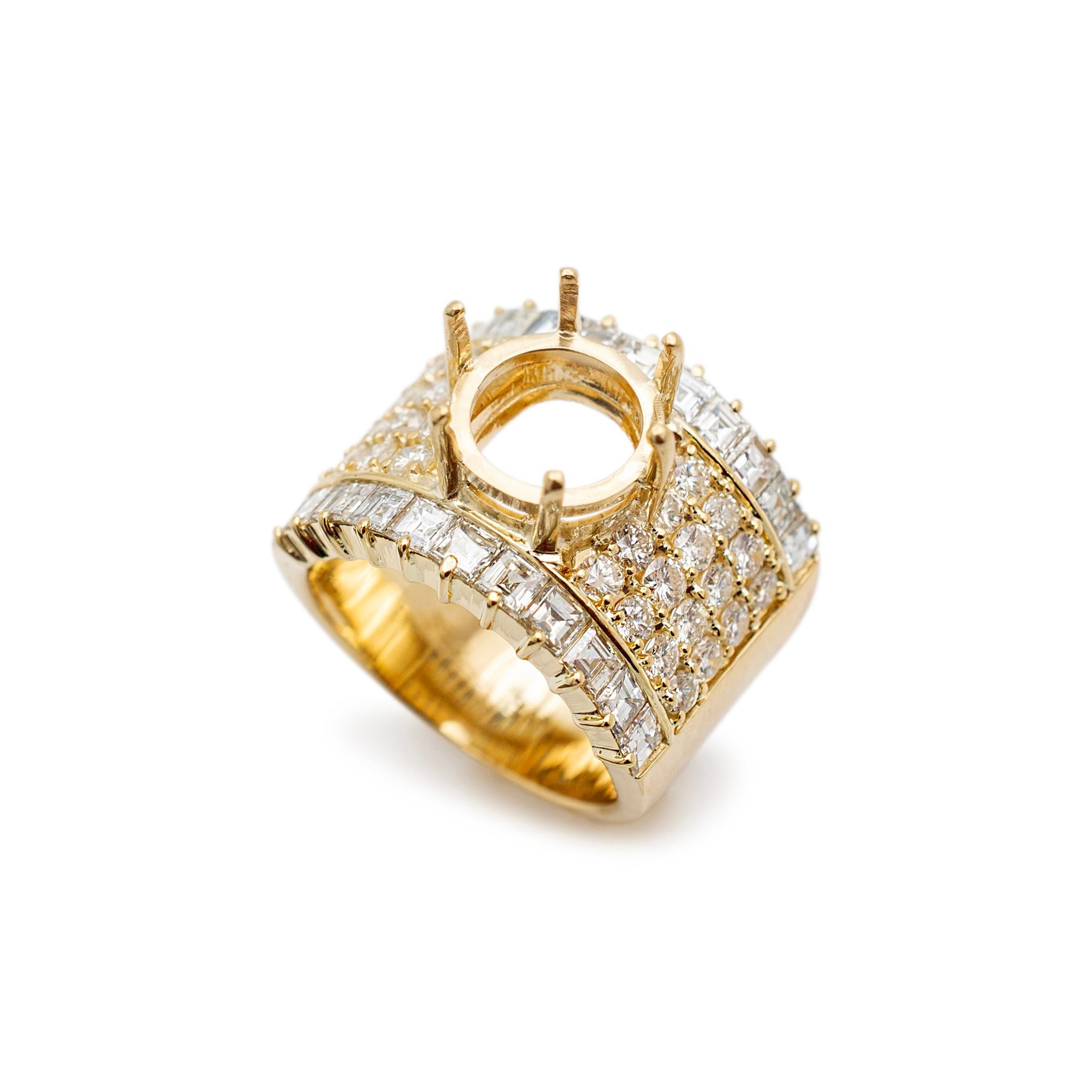 Metal Type: 18K Yellow Gold

Ring Size: 8

Width: 17.50 mm tapering to 9.45 mm

Weight: 17.25 grams

Diamond semi-mount ring with a tapered, comfort-fit shank. The metal was tested and determined to be 18K yellow gold. Engraved with 