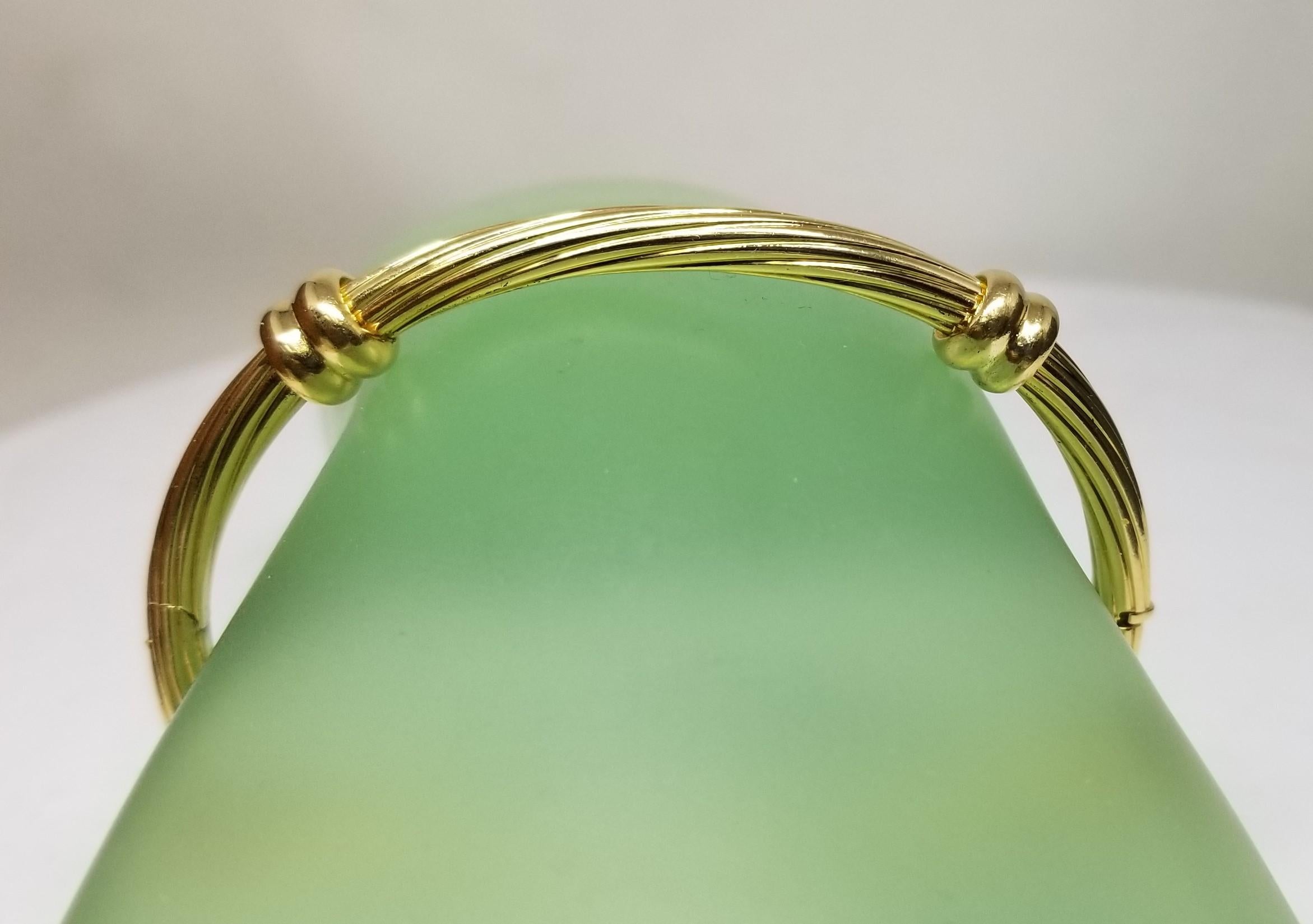 Bracelet torsadé en or jaune 18k 