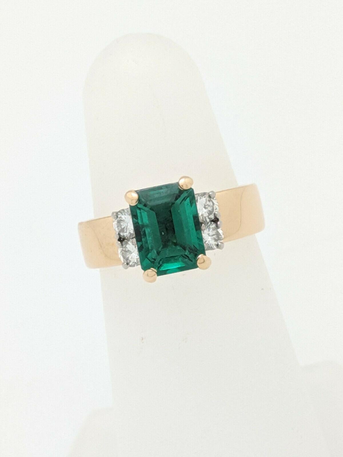 Art Deco 18 Karat Yellow Gold Jabel Chatham Emerald and Diamond Ring