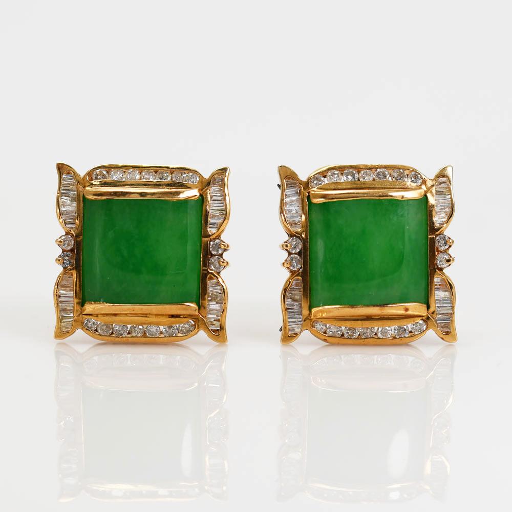 Ladies 18k yellow gold jade and diamond earrings.
The main setting of the earrings test 18k and the posts with lever test 14k.
The earrings weigh 14.4 grams gross weight.
The green jade is high quality and high color.
Untreated.
Each piece measures