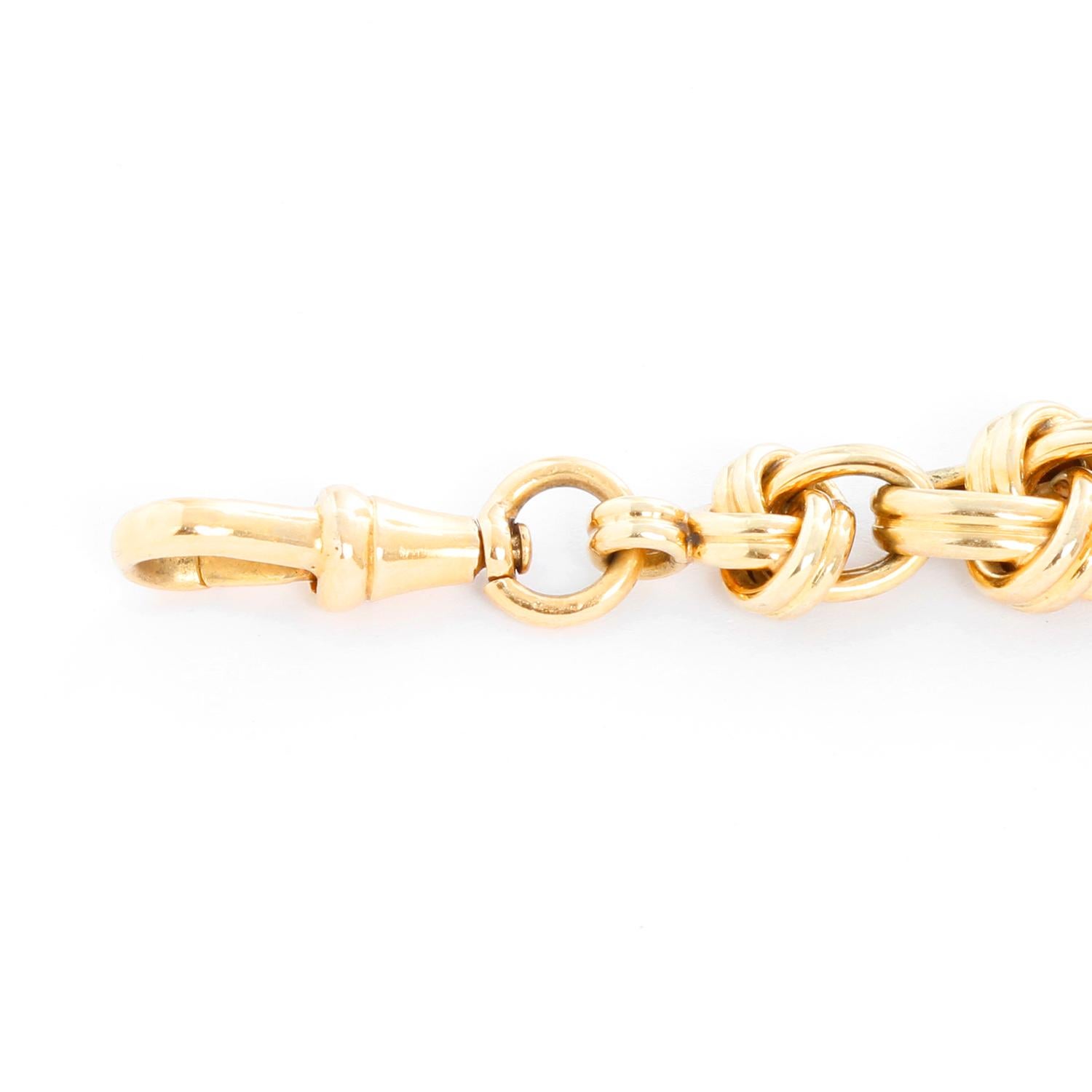 18K Yellow Gold Knot Lapel Pin - Pre-owned five knot lapel pin. Total length 3.5 inches. Total weight 13.2 grams. .