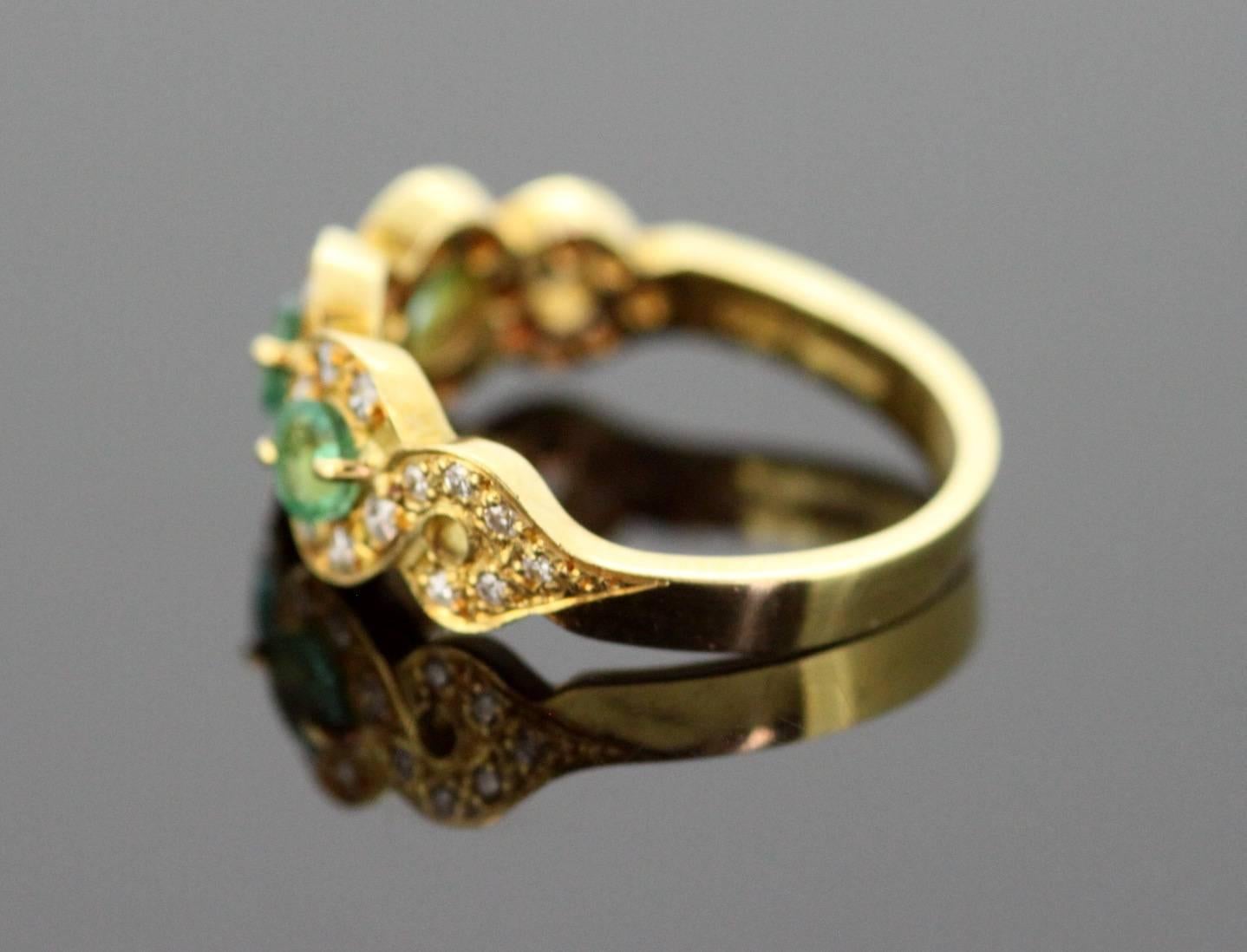 18 Karat Yellow Gold Ladies Ring with Emerald and Diamonds 1