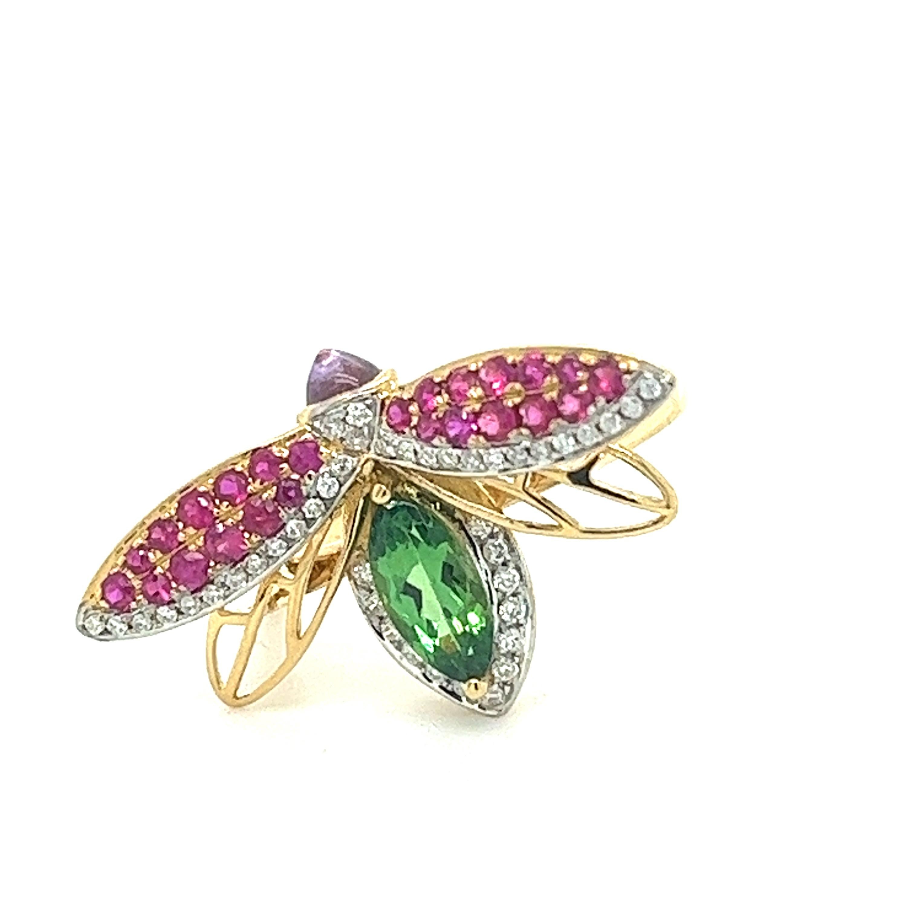 18K Yellow Gold Ladybug Ring with Diamonds & Rubies
43 Diamonds - 0.18 CT
1 Green Garnet - 0.68 CT
1 Purple Tourmaline - 0.26 CT
24 Rubies - 0.36 CT
18K Yellow Gold -  4.21 GM

Unleash the enchantment of nature's embrace with our exquisite 18K
