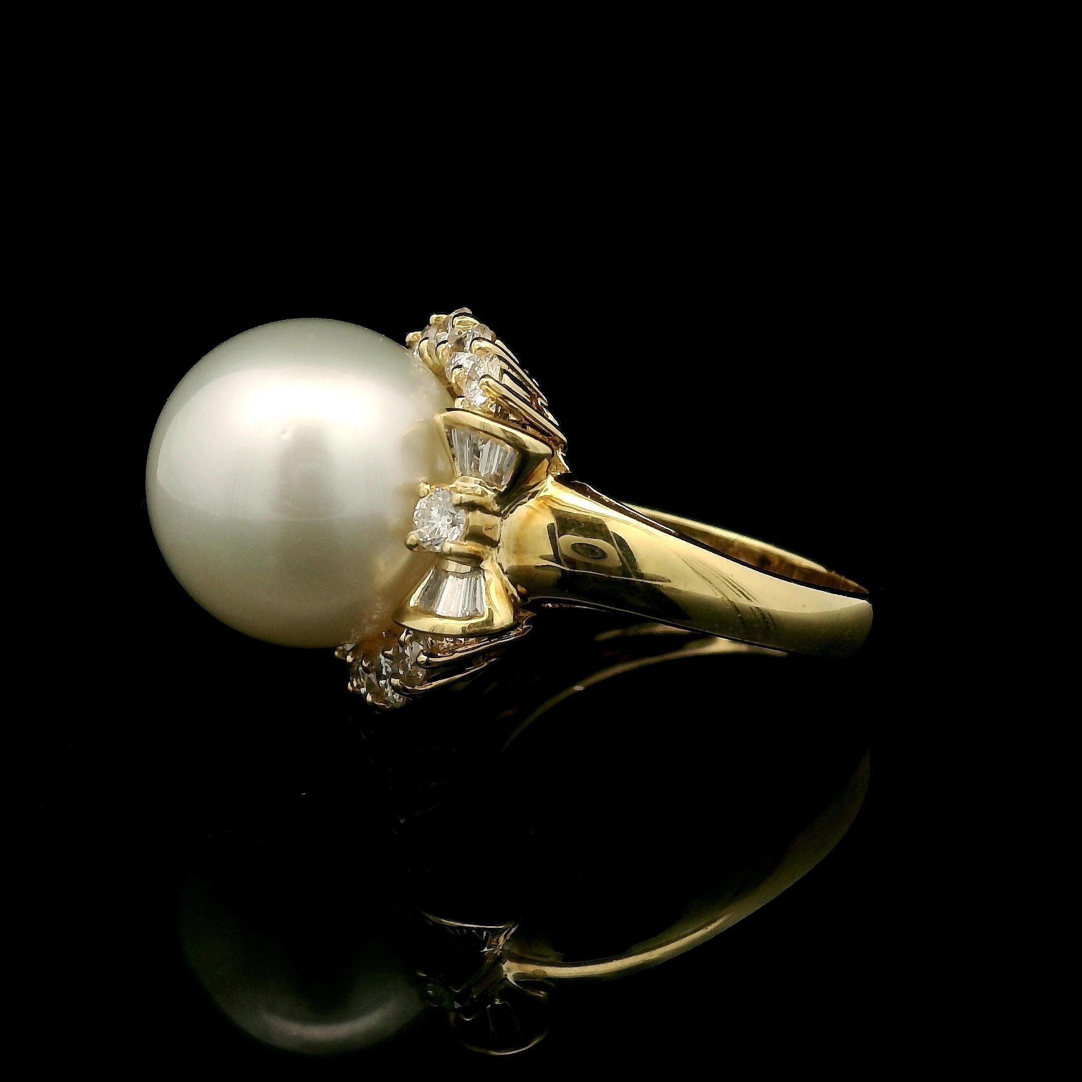--Stone(s):--
(1) Genuine Cultured Pearl -Round Shape- Pure White Color - Excellent Luster - 13.5mm (approx.)
Natural Genuine Diamonds - 12 Round Brilliant Cut w/ 12 Tapered Baguette Cut - Prong w/ Channel Set - F/G Color - VS2/SI1 Clarity - 0.90ctw