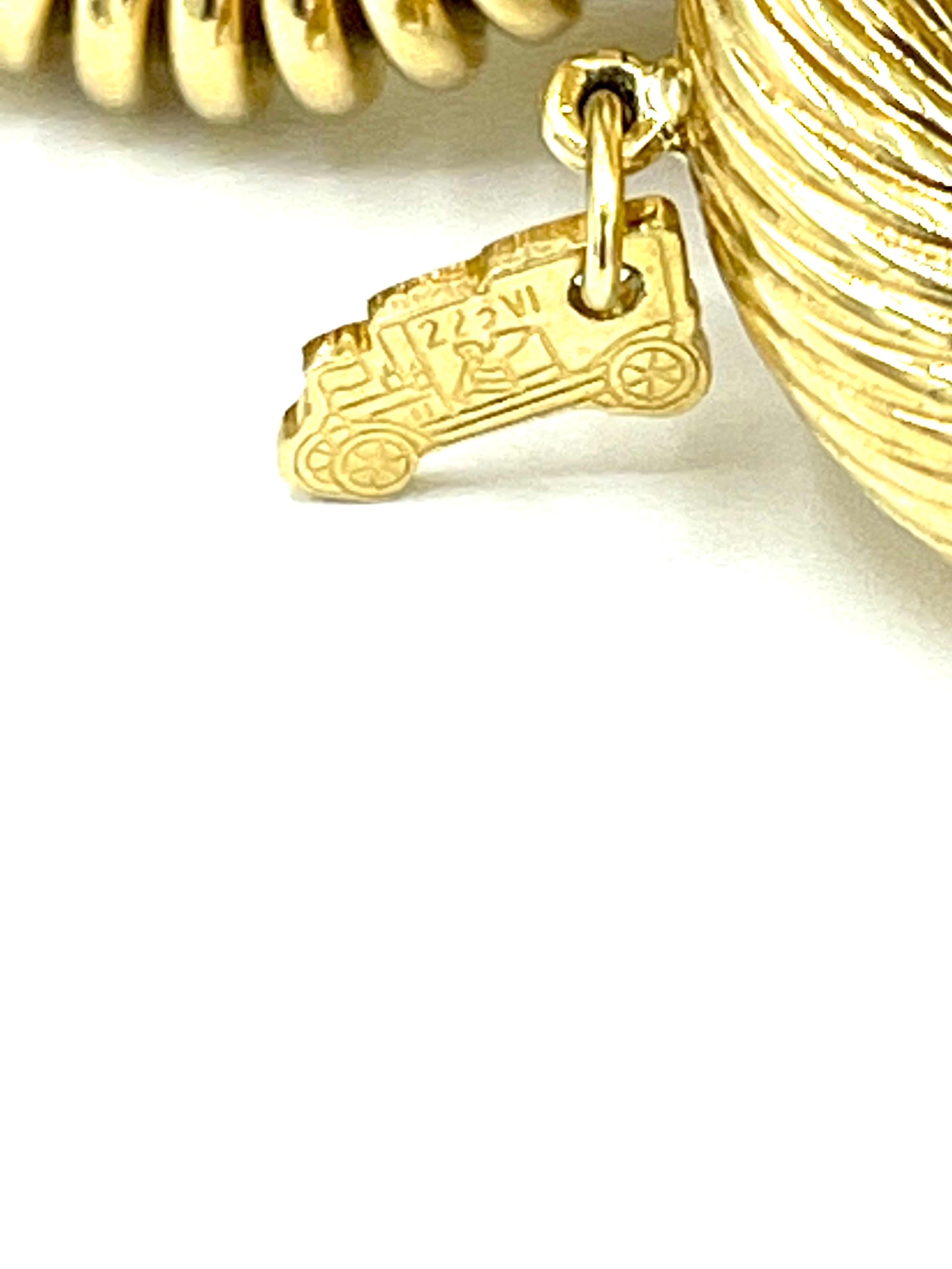 Modern 18K Yellow Gold Large Circular Spiral Link Bracelet For Sale