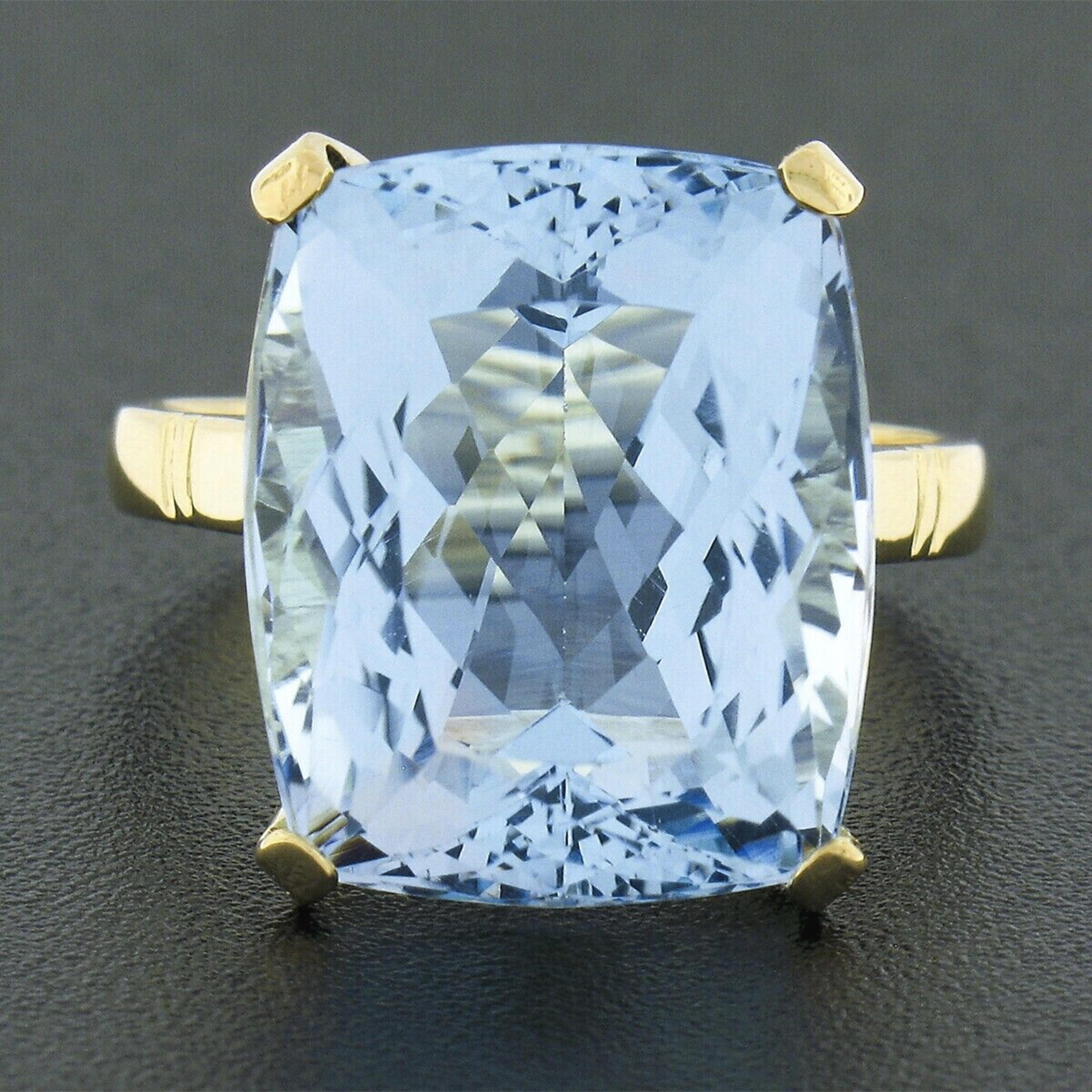 Up for sale we have an absolutely stunning, GIA certified, aquamarine solitaire cocktail ring. The fine quality aquamarine is a large rectangular cushion cut stone, weighing approximately 11.50 carats, with the most outstanding and soothing medium