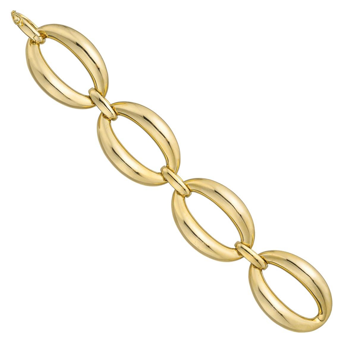 18 Karat Yellow Gold Large Oval Four Link Bracelet For Sale