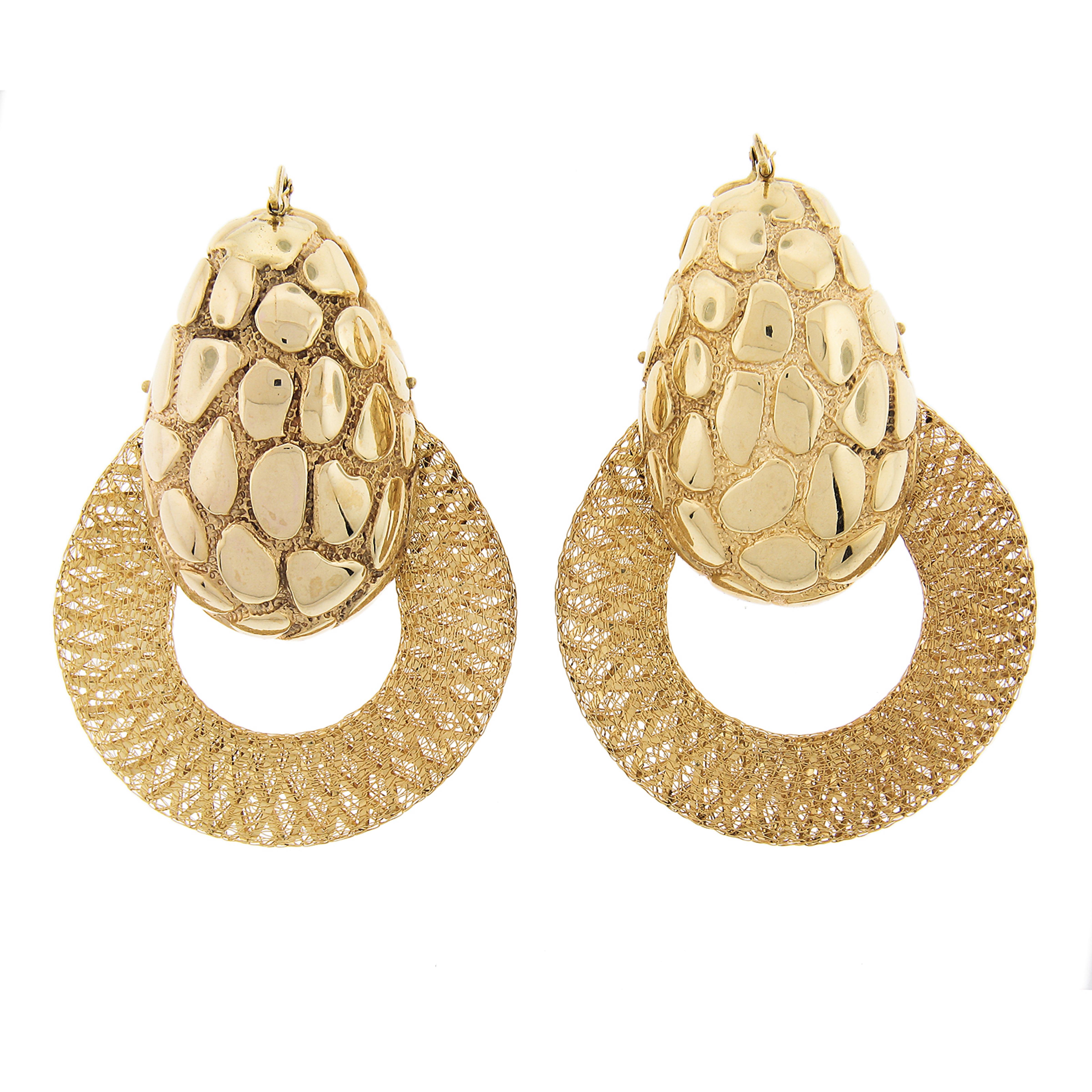 Material: 18K Solid Yellow Gold
Weight: 19.79 Grams
Backing: Snap Closures (pierced ears required)
Overall Width: 44.4 mm (1.7