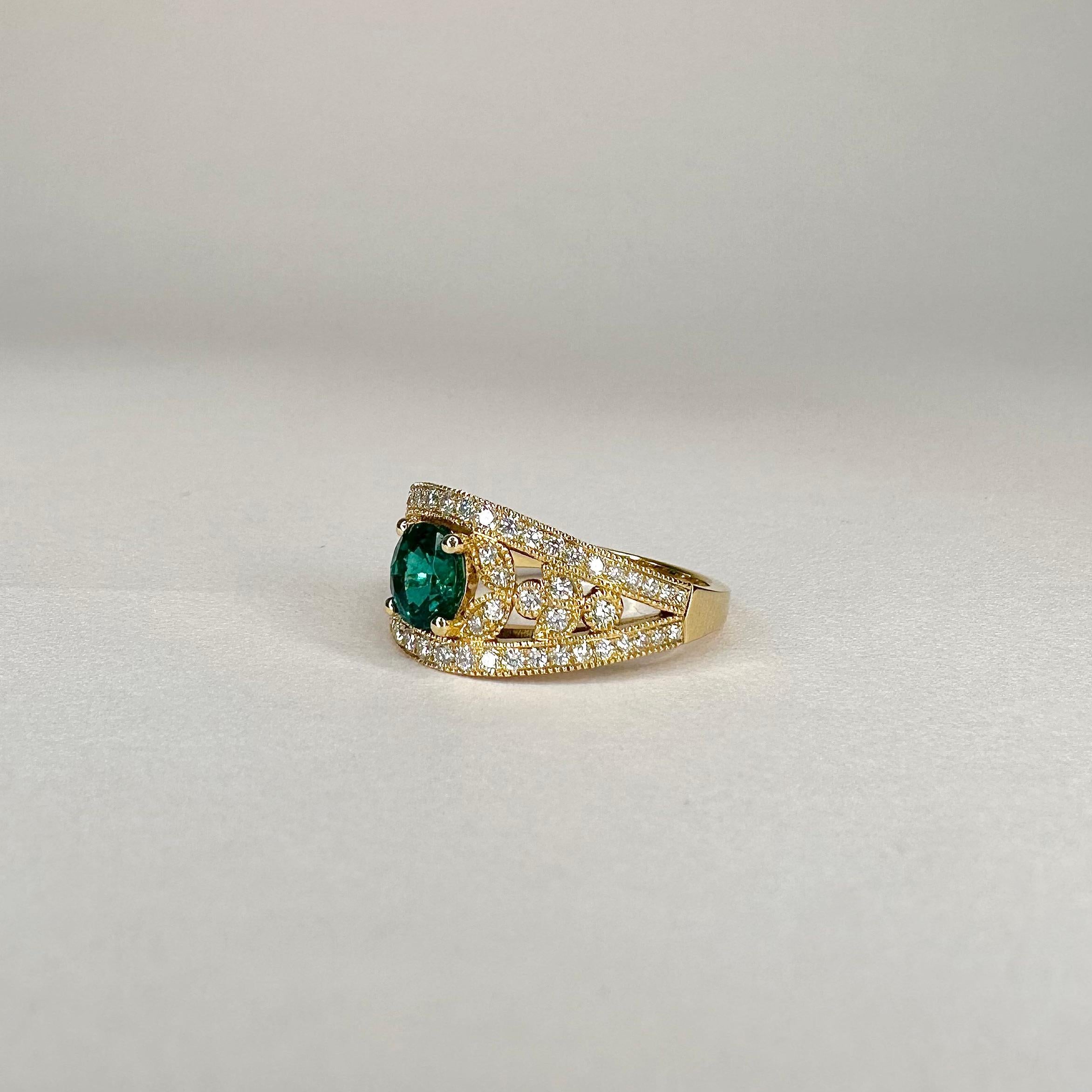 For Sale:  18k Yellow Gold Laurel Leaf Design 0.85 Ct Vivid Green Emerald Ring with Diamond 5