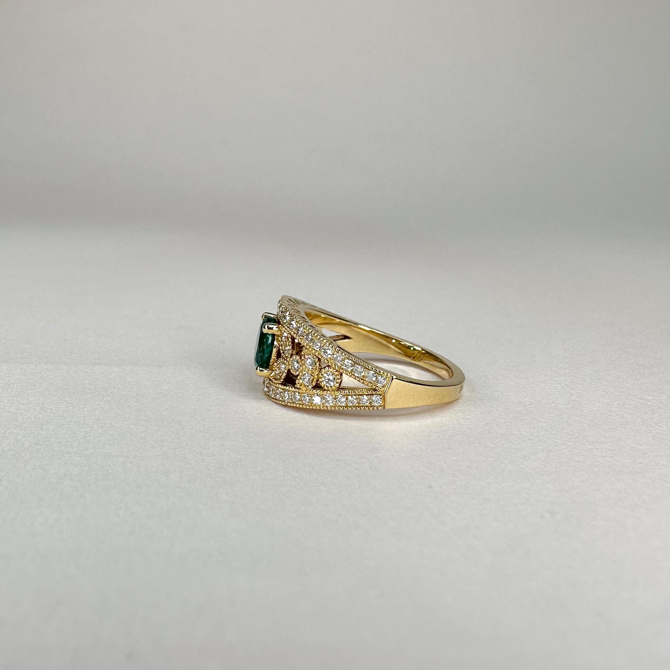 For Sale:  18k Yellow Gold Laurel Leaf Design 0.85 Ct Vivid Green Emerald Ring with Diamond 6