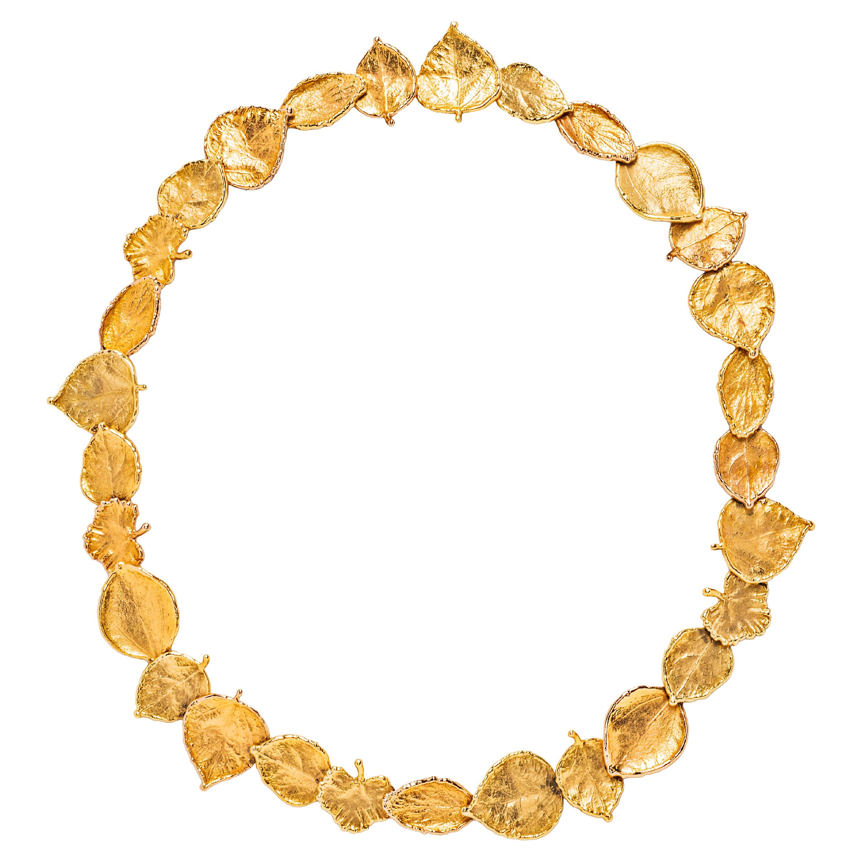 Collier en or jaune 18k en forme de feuille