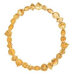 Collier en or jaune 18k en forme de feuille