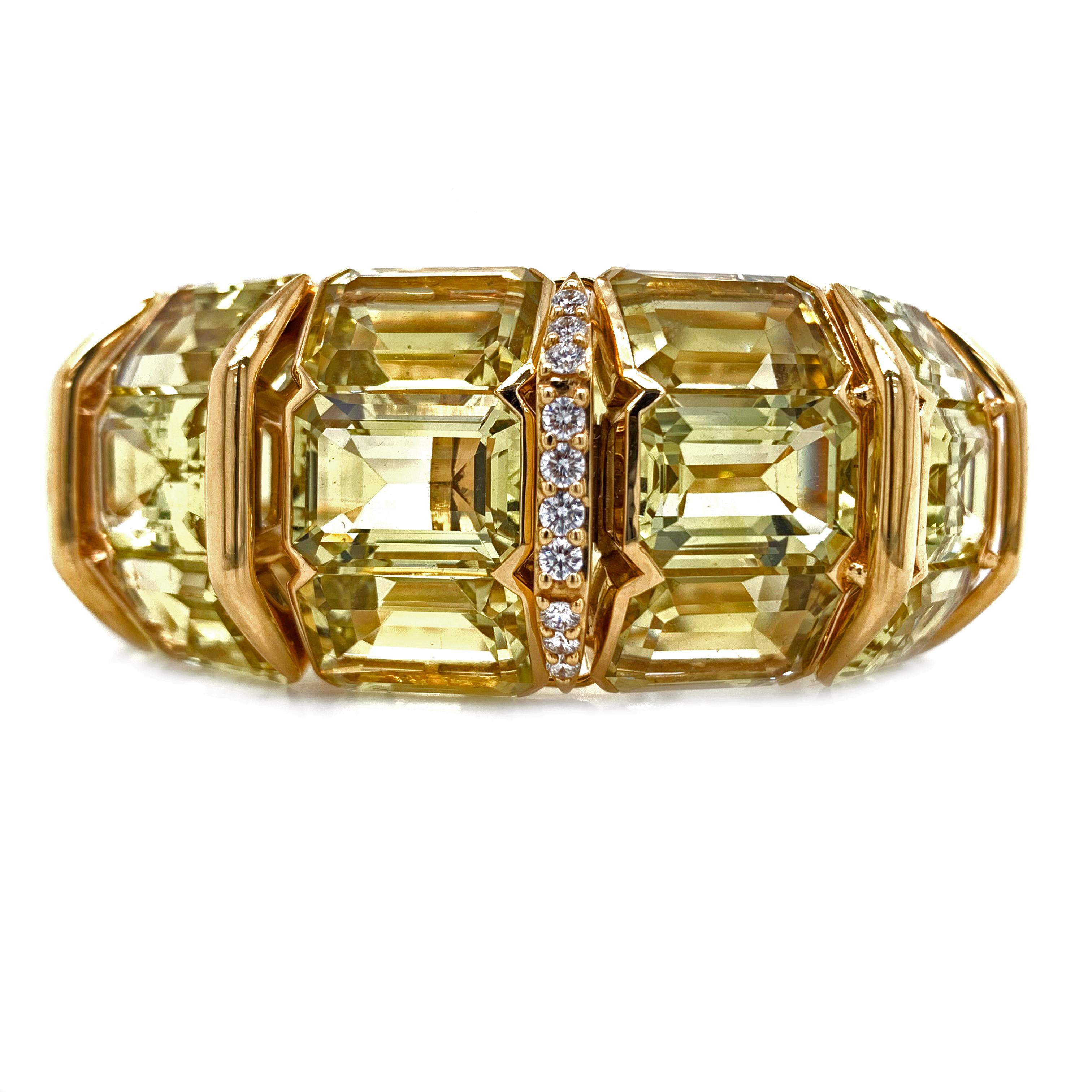 A beautiful 18k yellow gold Lemon Quartz and Diamond bangle.  Crafted in 18k yellow gold this beautiful 255.93cts Lemon Quartz bracelet has an inner diameter of  6.5in and outer diameter of 9.6in and weighs 116.8grams. Beatifully crafted in