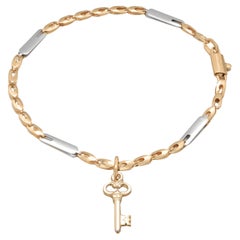 18K Yellow Gold Link Charm Bracelet with a Key Charm