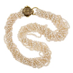 Collar multihebra de perlas de agua dulce de 30" con cierre de cabeza de león de oro amarillo de 18k