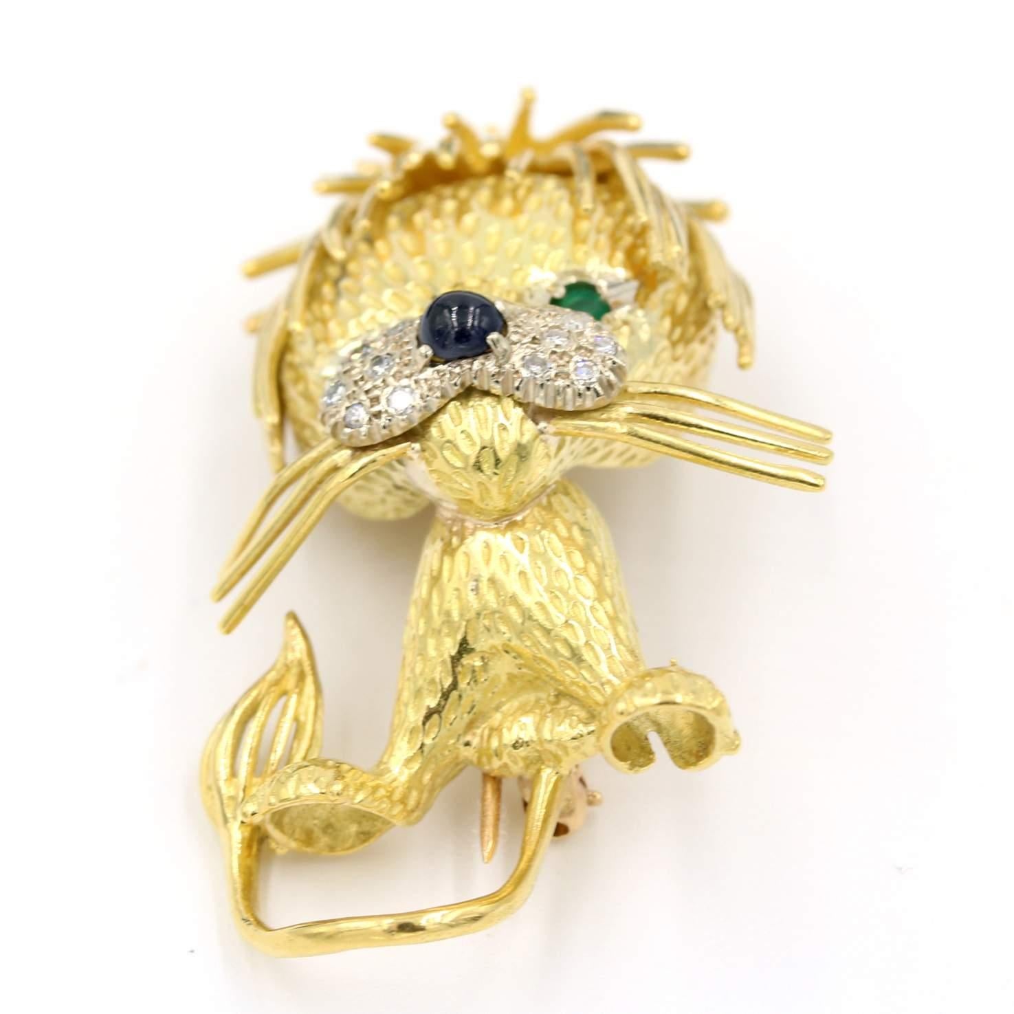 Lion Pin/Brooch In 18K Yellow Gold Featuring Emerald In The Eyes, A Sapphire Nose, And A Diamond Mouth. 