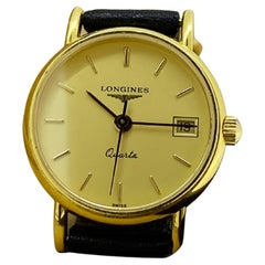 Longines Réf. L74906 Presence Champagne Montre pour femme en or jaune 18 carats, années 2000