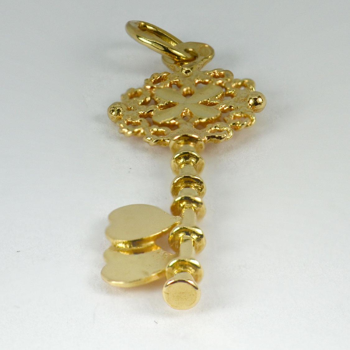 solid gold key pendant