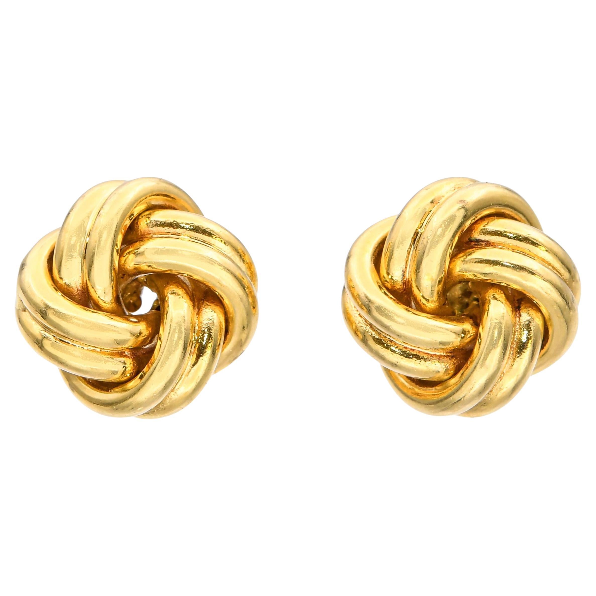 Boucles d'oreilles nœud d'amour en or jaune 18k