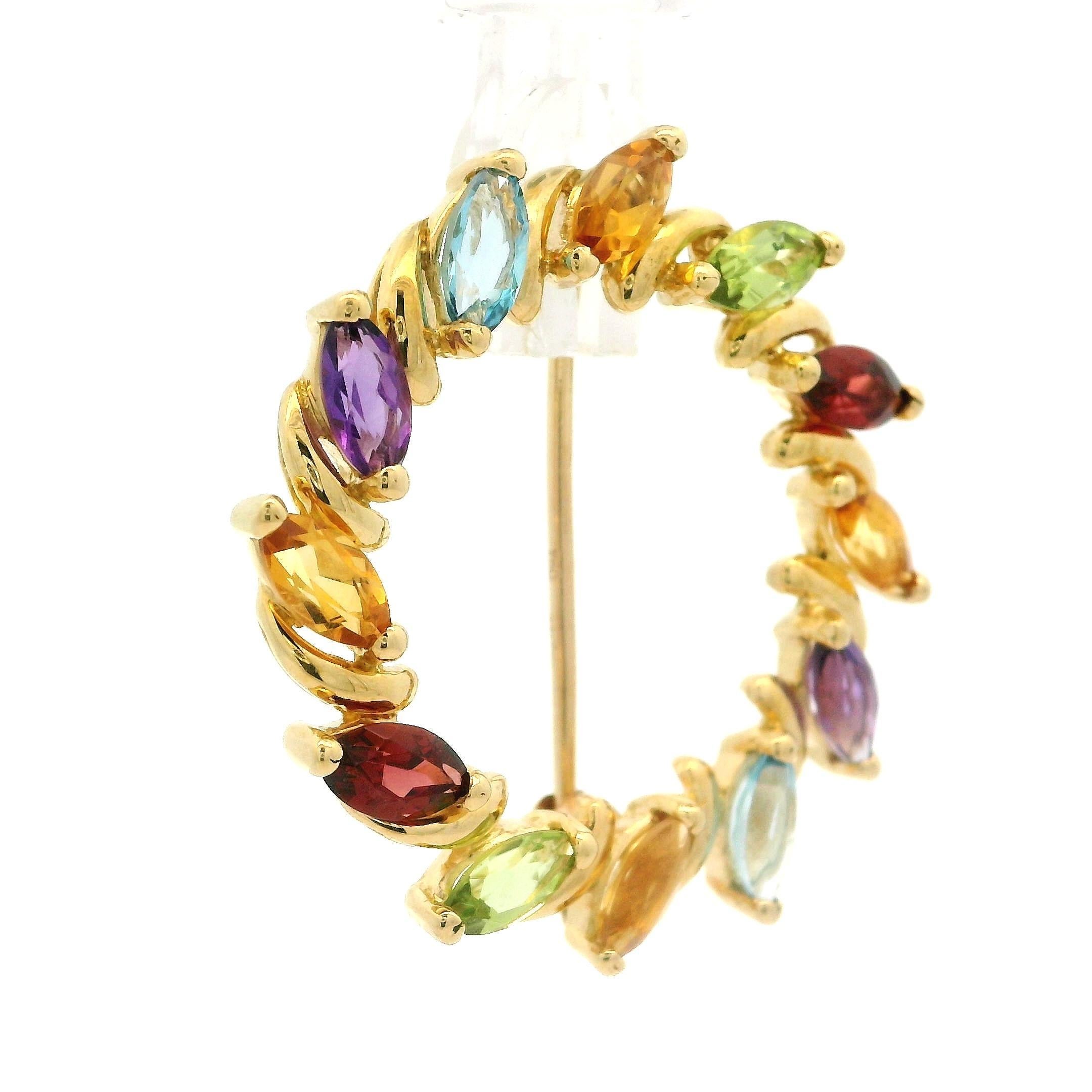 -- Stein(e) --
(12) Natürliche, echte Edelsteine - Marquise-Schliff - Zackenfassung - Lila, Blau, Orange, Grün & Rote Farben - 5,9x2,9mm pro Stück (ca.)

MATERIAL: Massives 18k Gelbgold
Gesamtgewicht: 5,33 Gramm
Gesamtdurchmesser: 29,9 mm