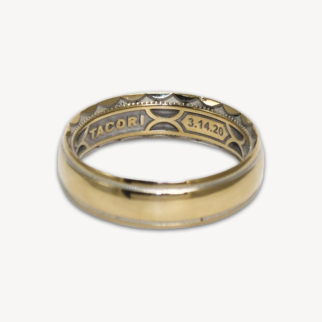 Men's 18k yellow gold designer wedding band by Tacori.
Stamped 18k, Tacori, and weighs 7 grams.
The ring has white gold mill grain near the edges.
The ring size is 9 and measures 6mm wide.
Looks almost new.