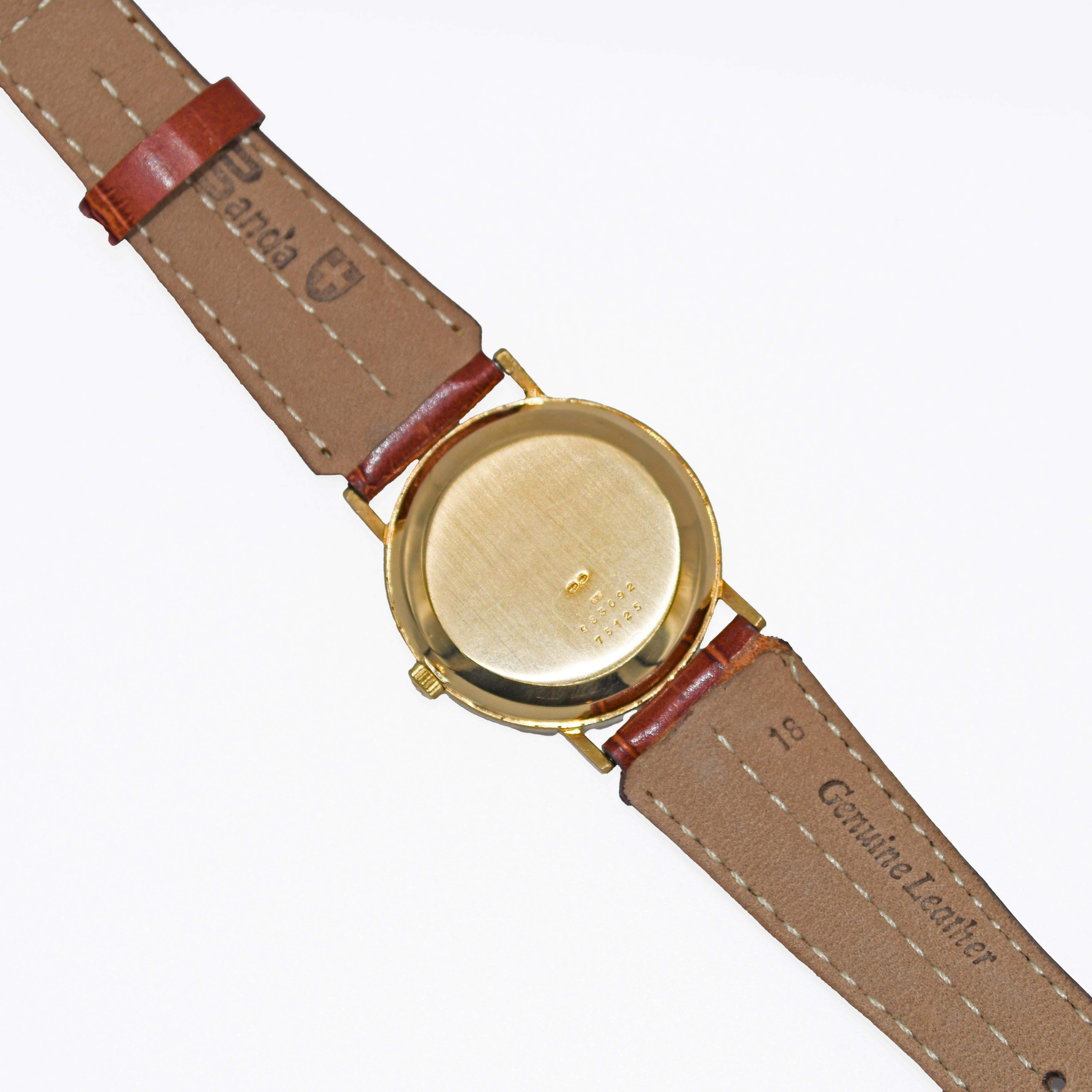 18 Karat Gelbgold Herrenuhr, Baume & Mercier Quarz 7