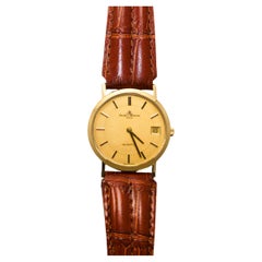 18 Karat Gelbgold Herrenuhr, Baume & Mercier Quarz