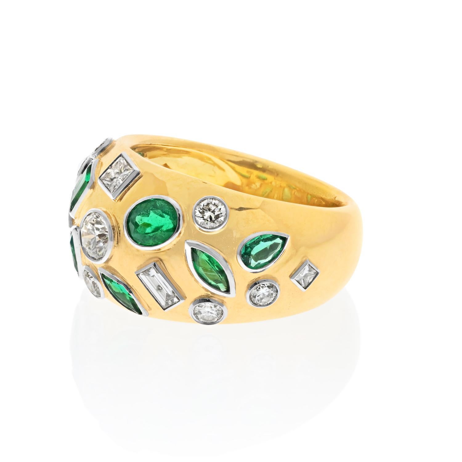 Elegance in Every Detail: Your Emerald and Diamond Wide Band Ring.

Indulge in the luxurious beauty of this wide band ring, adorned with bright burnish and bezel-set diamonds and vibrant green emeralds. Whether you wear it as a stylish cigar band or