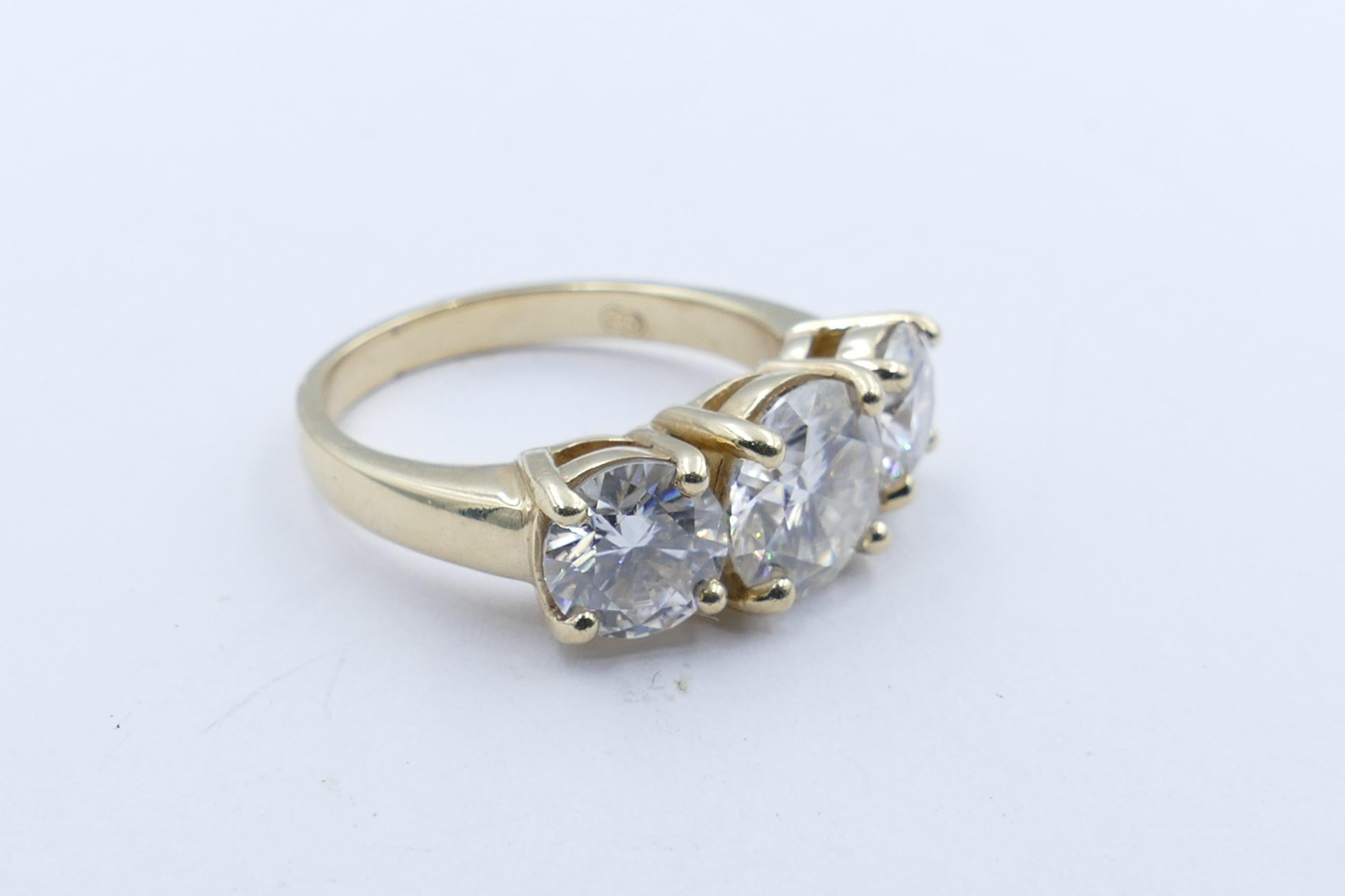 Women's or Men's 18 Karat Yellow Gold Moissanite Trilogy Ring