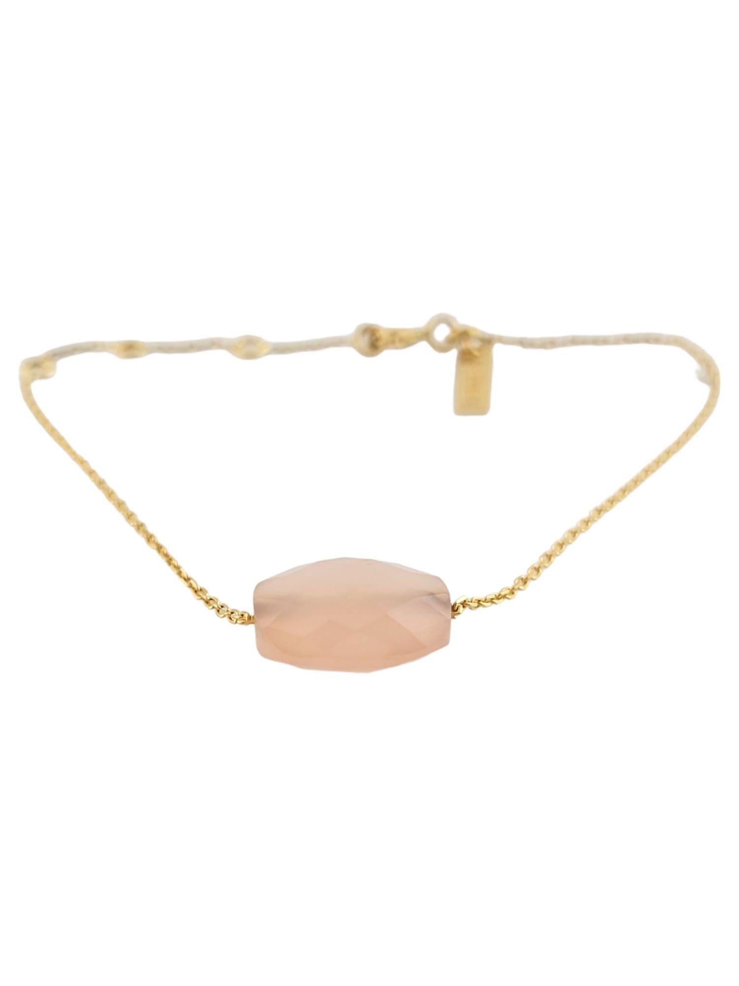 This beautiful 18K gold bracelet by Morganne Bello features a gorgeous guava quartz stone!

Size: 6 3/4