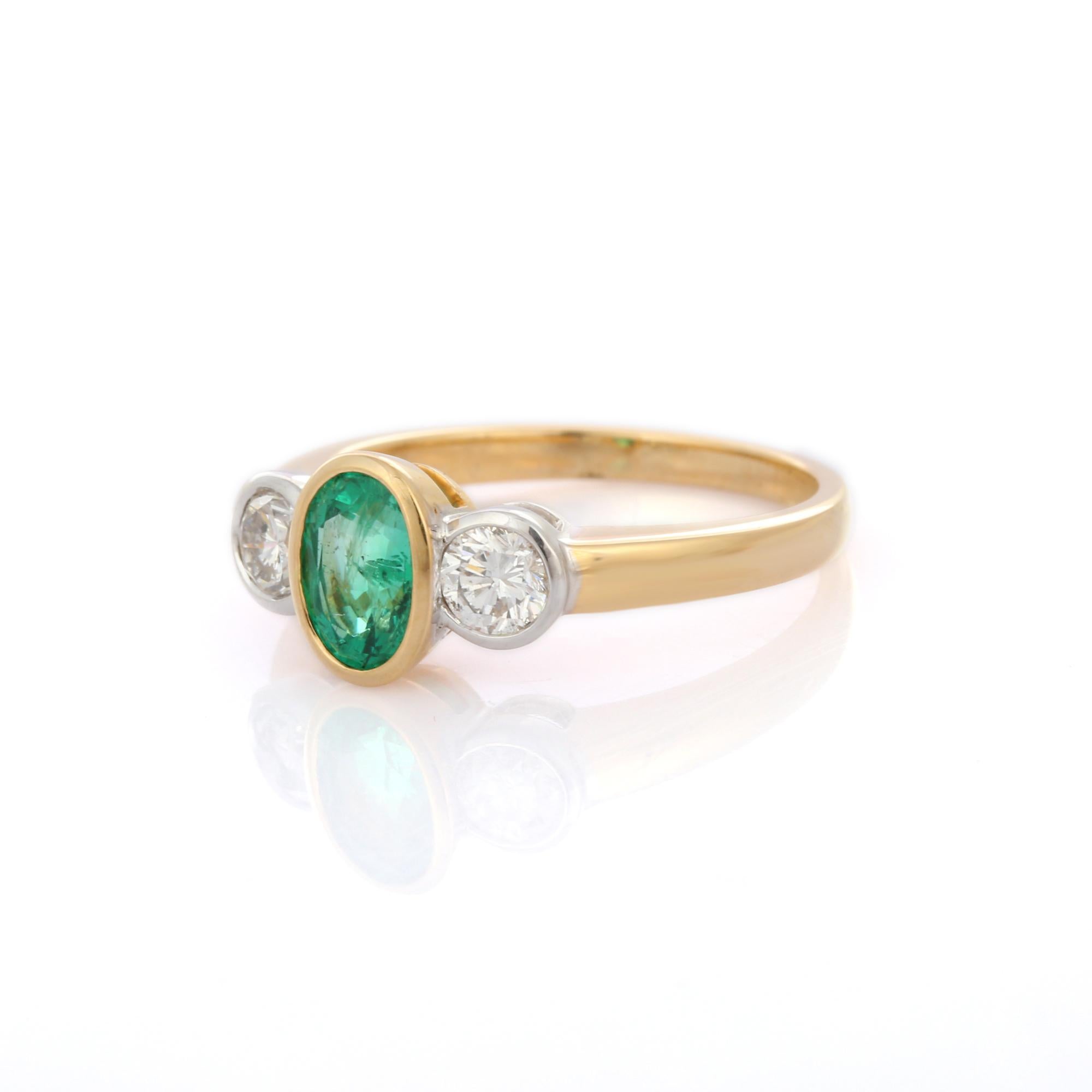 For Sale:  18K Solid Yellow Gold Bezel Set Oval Cut Emerald and Diamond Three Stone Ring  3