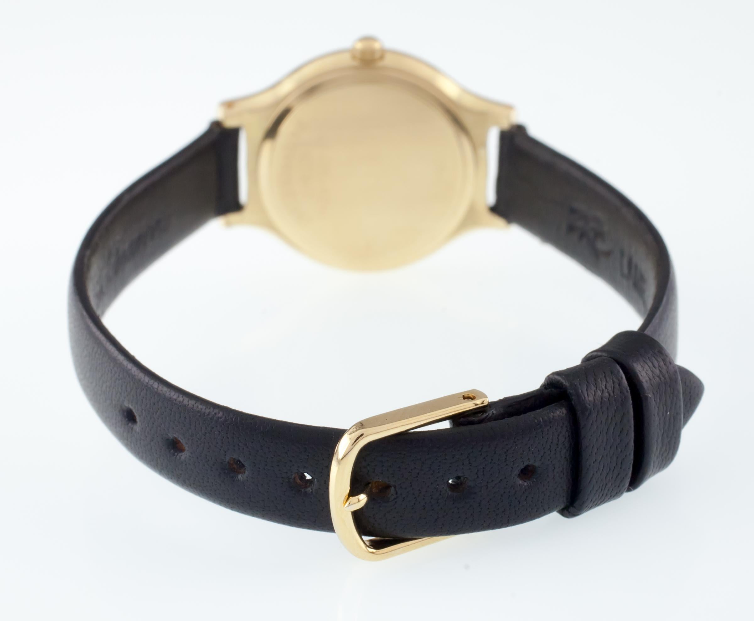 Modern 18k Yellow Gold Movado Women's Quartz Watch w/ Black Leather Band Nice For Sale