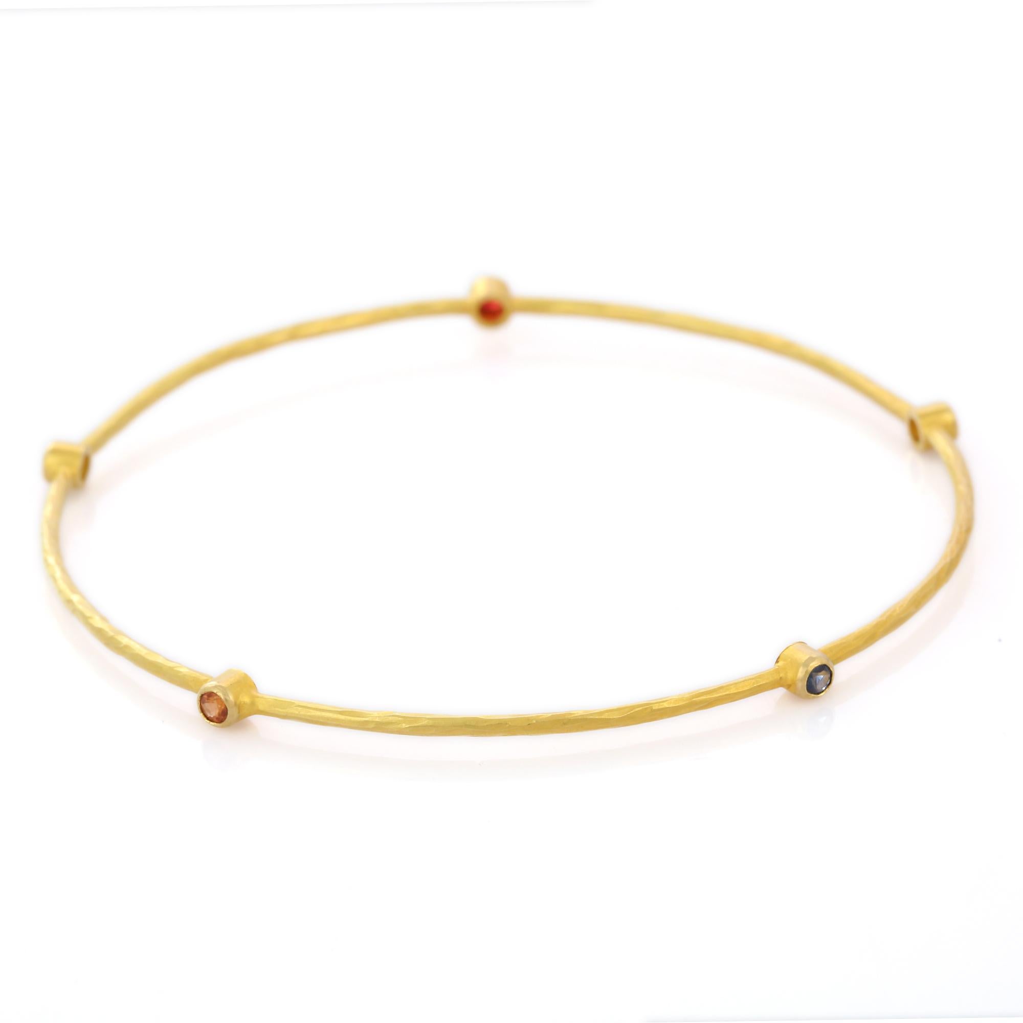 Multi gemstone Bangle in 18K Gold. It’s a great jewelry ornament to wear on occasions and at the same time works as a wonderful gift for your loved ones. These lovely statement pieces are perfect generation jewelry to pass on.
Bangles feel
