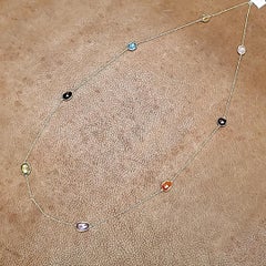 Collana in oro giallo 18k con più pietre preziose Cts 27.10