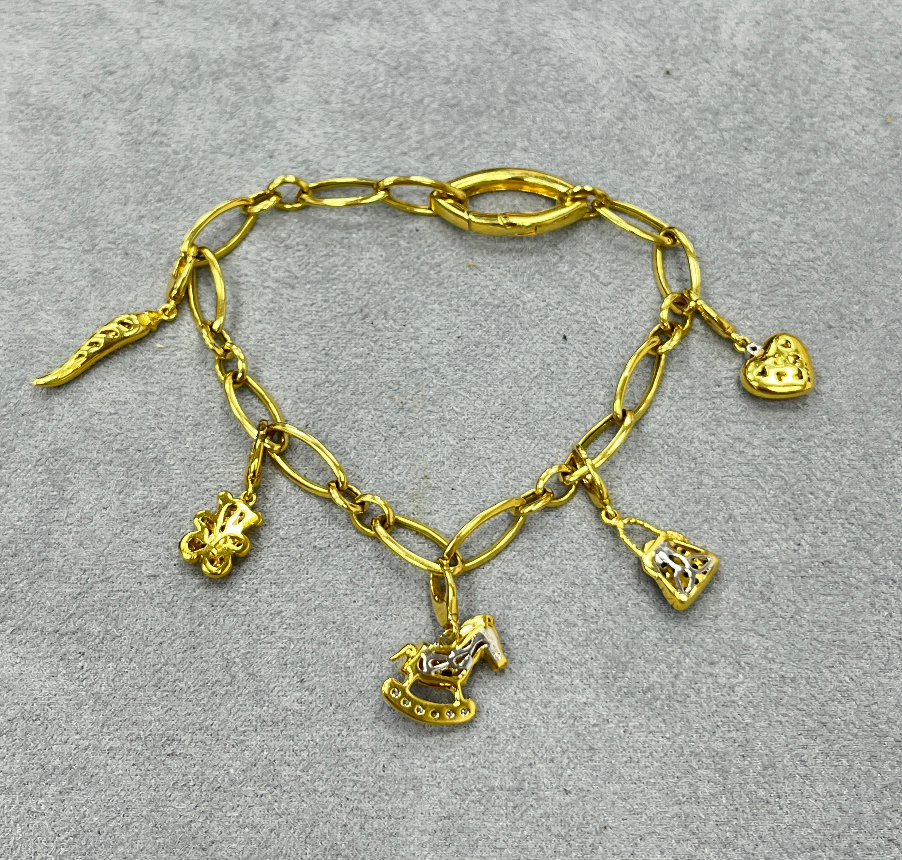 Modern 18K Yellow Gold Multi Gemstone Diamond Charm Bracelet For Sale