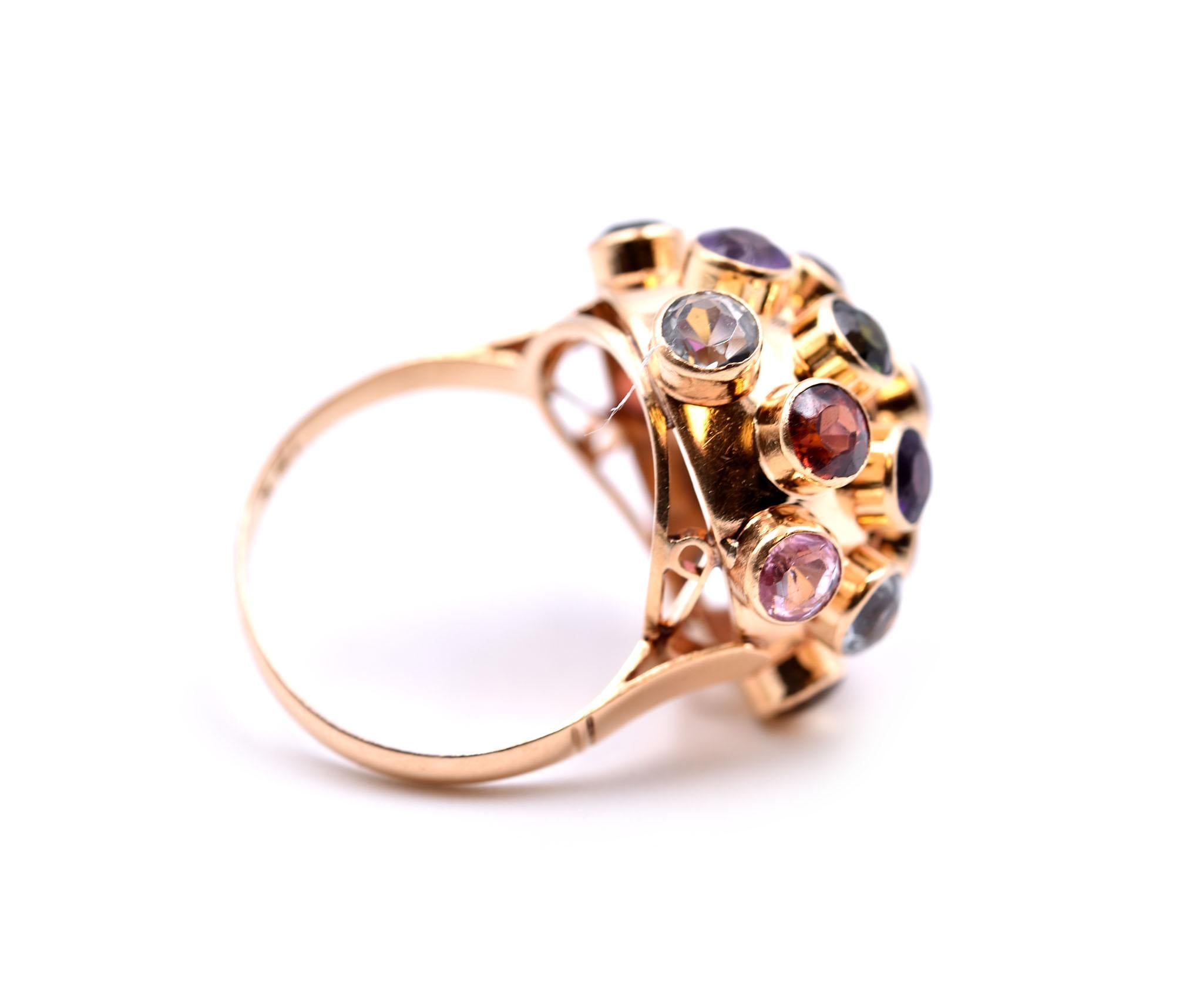 Designer: custom design
Material: 18k yellow gold
Gemstones: citrine, amethyst, garnet, blue topaz, green tourmaline and pink tourmaline
Ring size: 5 ½ (please allow two additional shipping days for sizing requests)
Dimensions: ring measures 14.37mm