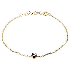 18 Karat Gelbgold Blumenarmband mit mehreren Edelsteinen, Karat 0,13 und runden Diamanten