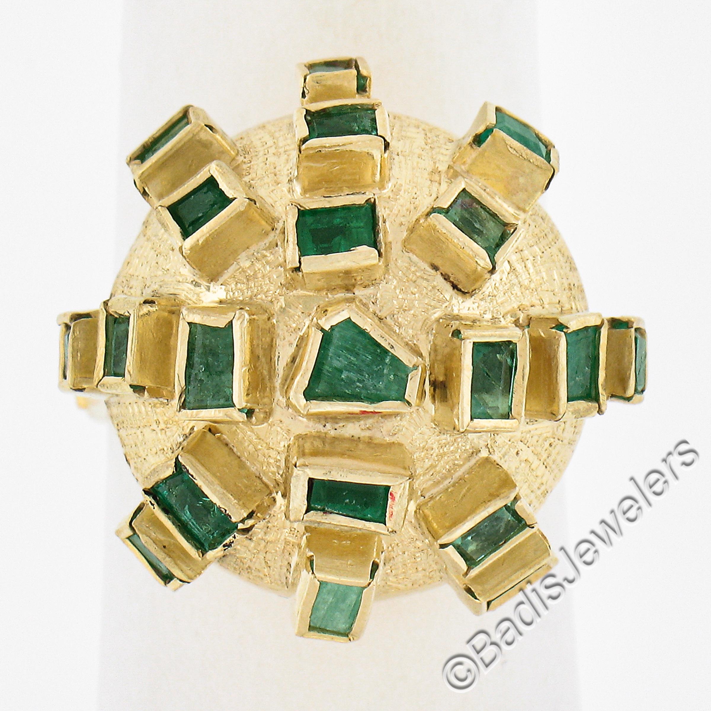 --Stone(s):--
(20) Natural Genuine Emeralds - Multi Shapes Cut - Bezel Set - Nice Green Color 

Material: Solid 18k Yellow Gold
Weight: 6.31 Grams
Ring Size: 6.0 (Fitted on a finger. We can custom size this ring. Please contact us prior to purchase