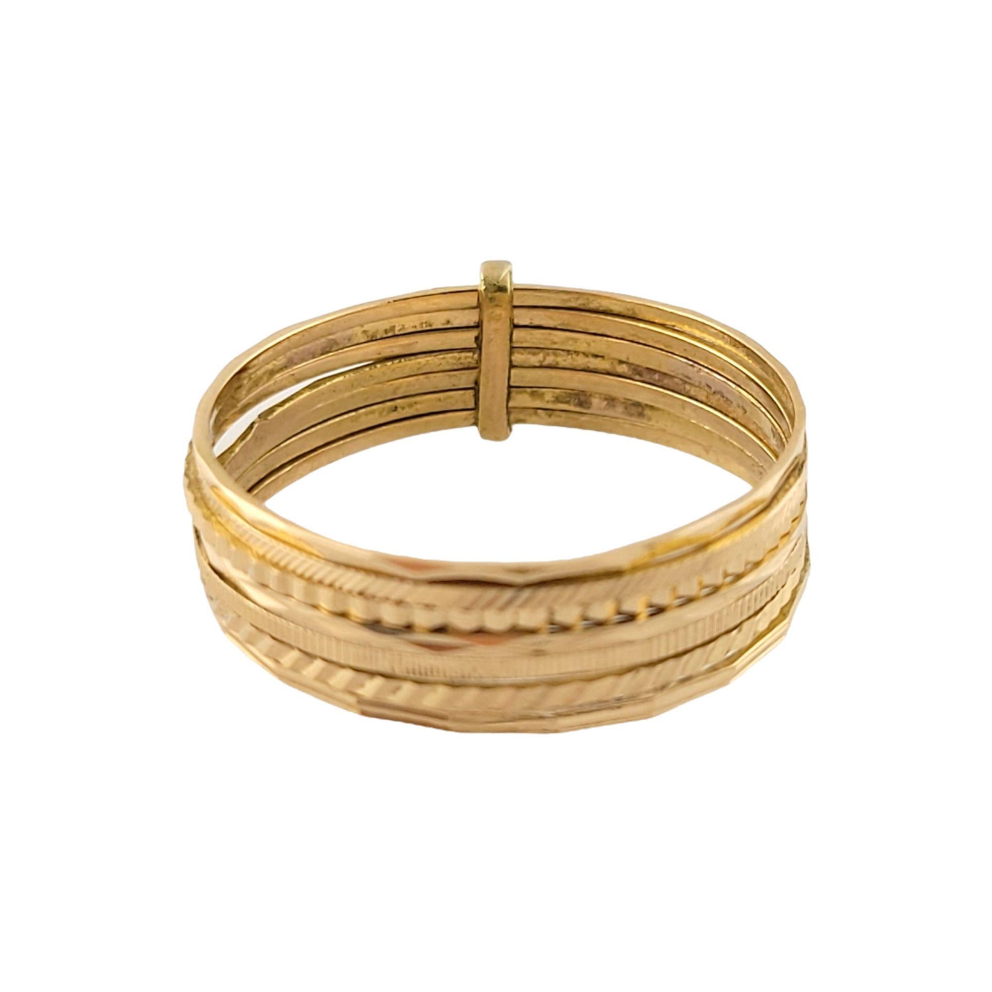 Vintage 18K Yellow Gold Multiple Texture Rings

Beautiful 18K yellow gold ring that features multiple thin textured rings tethered together by a gold link.

Shank: 11mm

Weight: 3.5 gr / 2.2 dwt

Size: 11.5

Tested 18K

Very good condition,