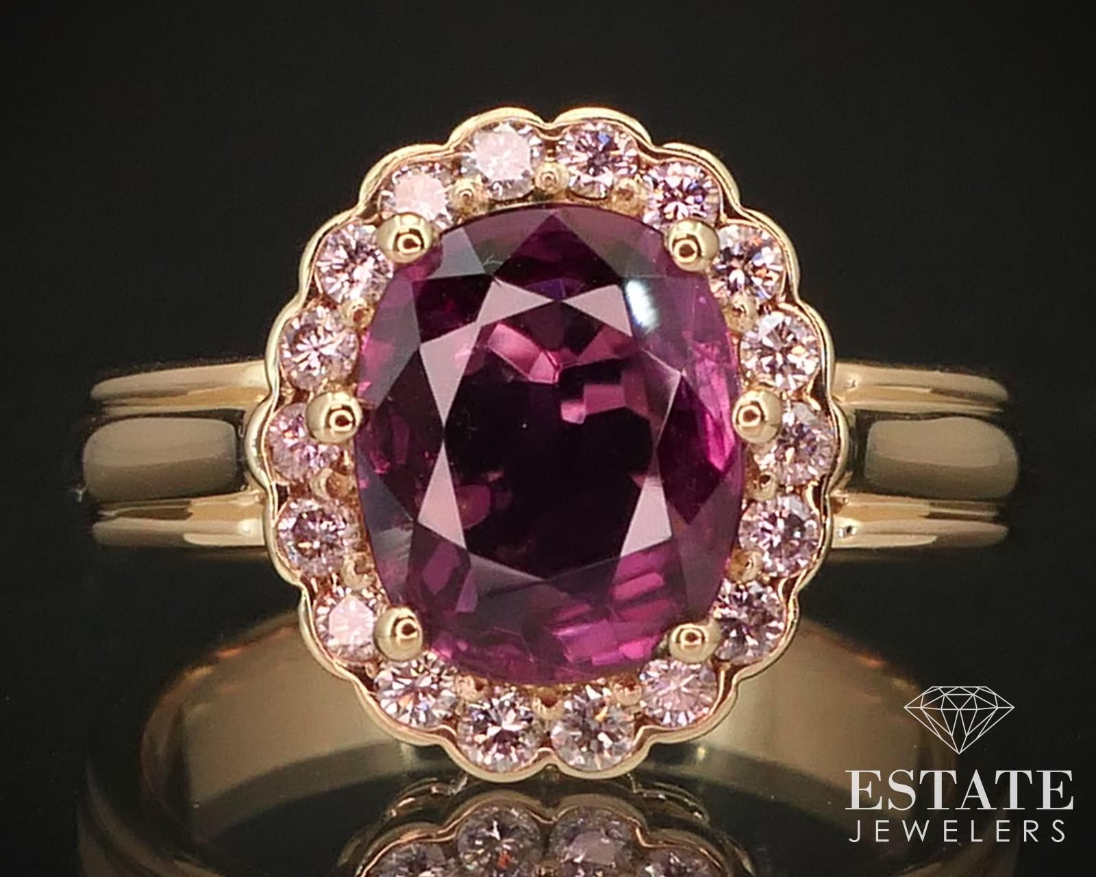 Stunning gold ring with a VIVID newly mounted natural 9.1mm by 7.2mm pink sapphire with .36ctw of round cut fancy colored natural pink diamonds. Rare combo and color of stones! VS2-SI clarity. 13mm tall face. stamped 18k SIZE-7